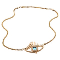 1.0 Carat Cabuchon Blue Topaz and Diamond Evil Eye Yellow Gold Necklace