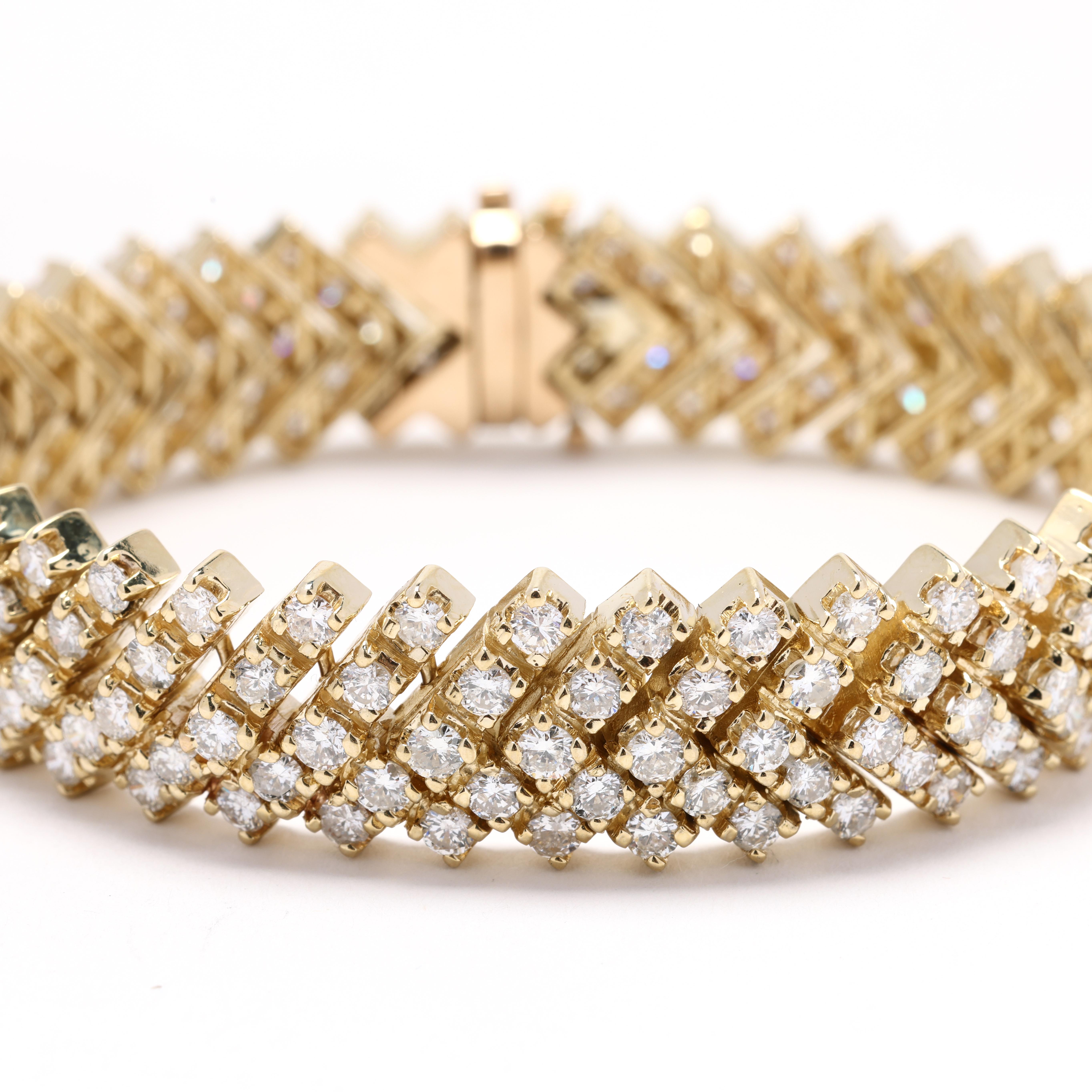 Indulge in luxury with this breathtaking 10ctw Diamond Link Bracelet. Expertly crafted in radiant 14k yellow gold, this opulent bracelet features a dazzling array of round brilliant diamonds meticulously set in intricately designed links, creating a