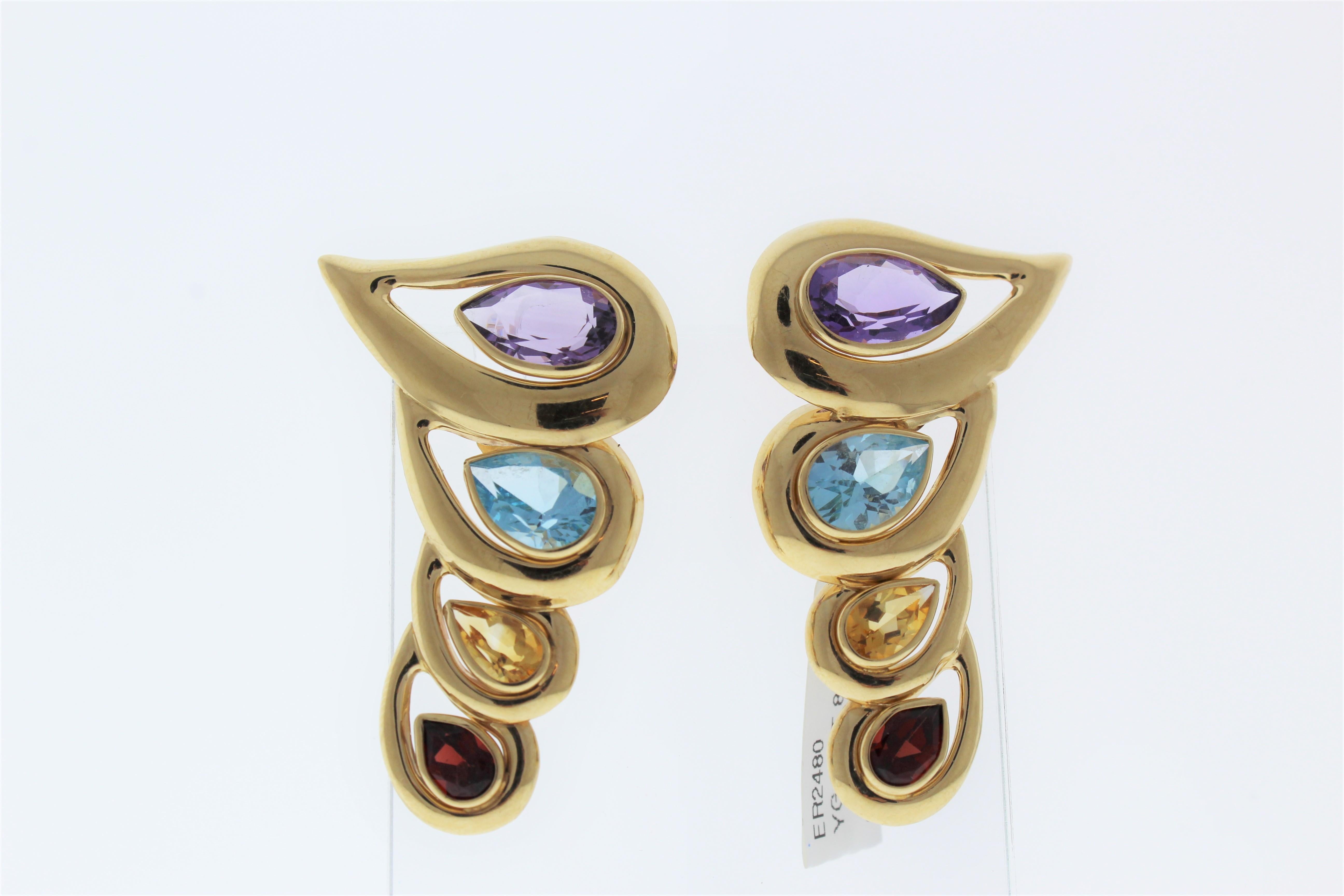These semi precious gemstones total up to 10 carats and are set in 14k Yellow Gold.