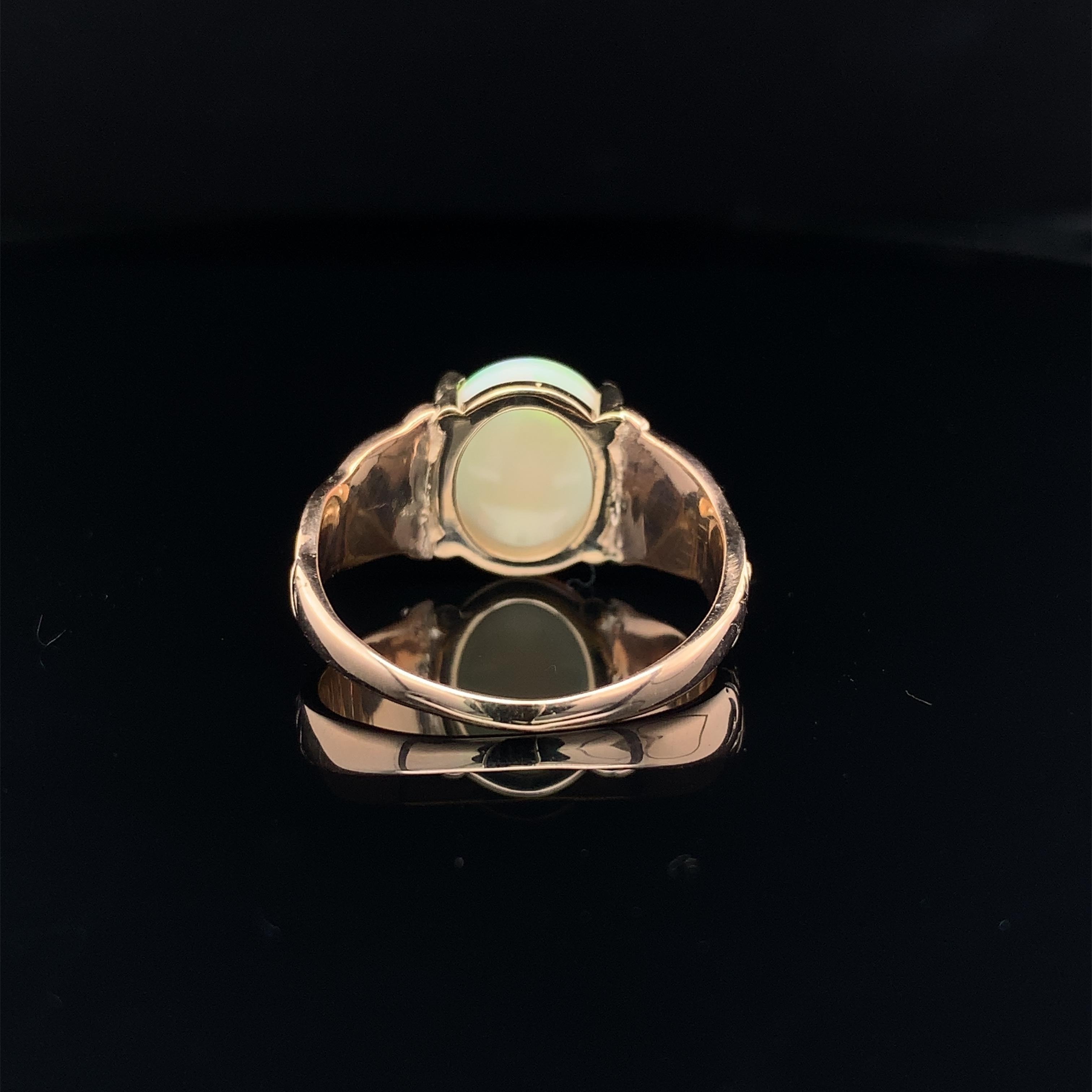 Oval Cut 10K and 14K Antique 1.98 carat Australian Opal Ring For Sale
