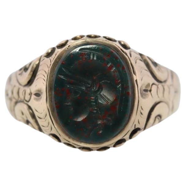 Bague en pierre de sang 10k. Bague sigillaire en or jaune, pierre de sang noire et rouge. Guerrier