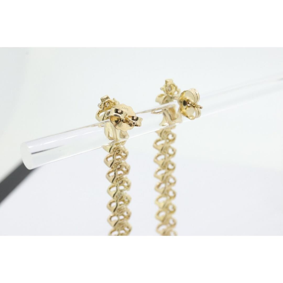 Boucles d'oreilles 10k diamant 3/4ctw. Boucles d'oreilles pendantes tennis à maillons en S avec diamants en champagne Pour femmes en vente
