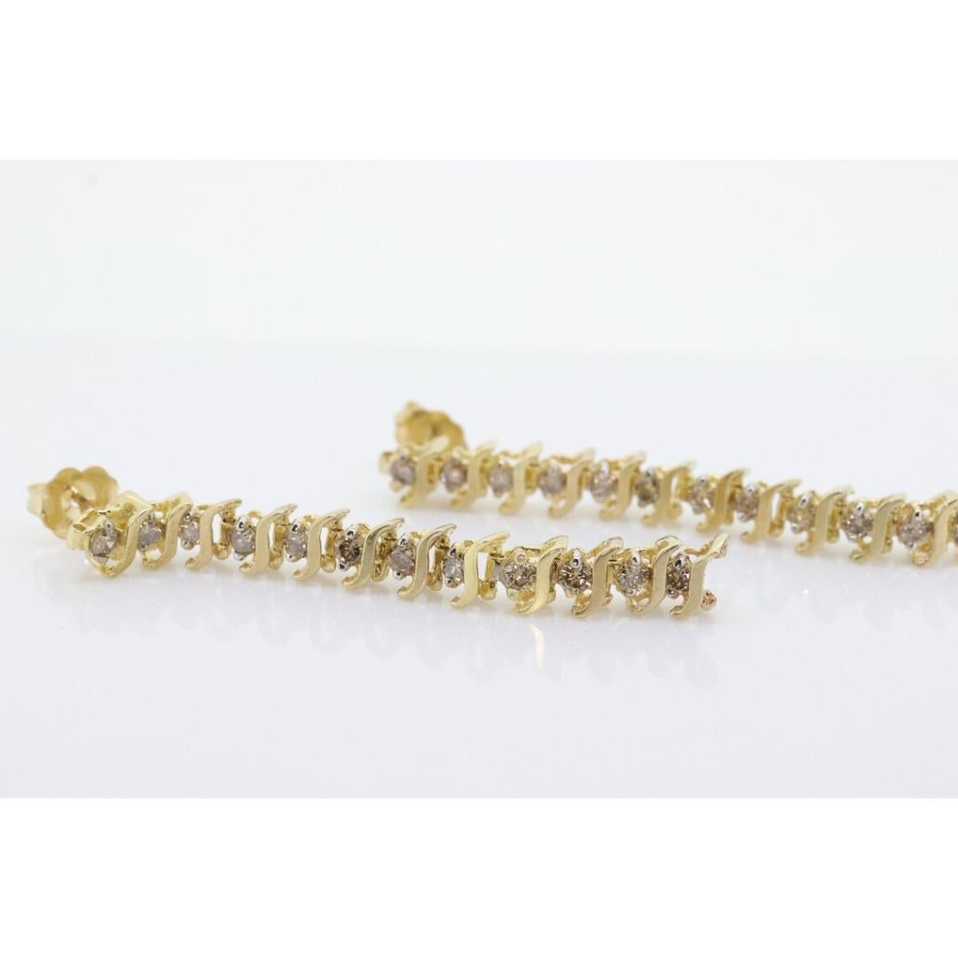 Boucles d'oreilles 10k diamant 3/4ctw. Boucles d'oreilles pendantes tennis à maillons en S avec diamants en champagne en vente 3