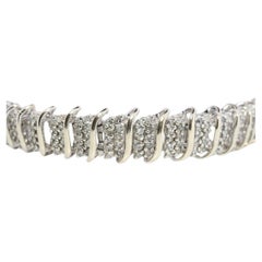 10k Diamond Tennis Bracelet. 10k S-LINK round diamond cluster Tennis bracelet.