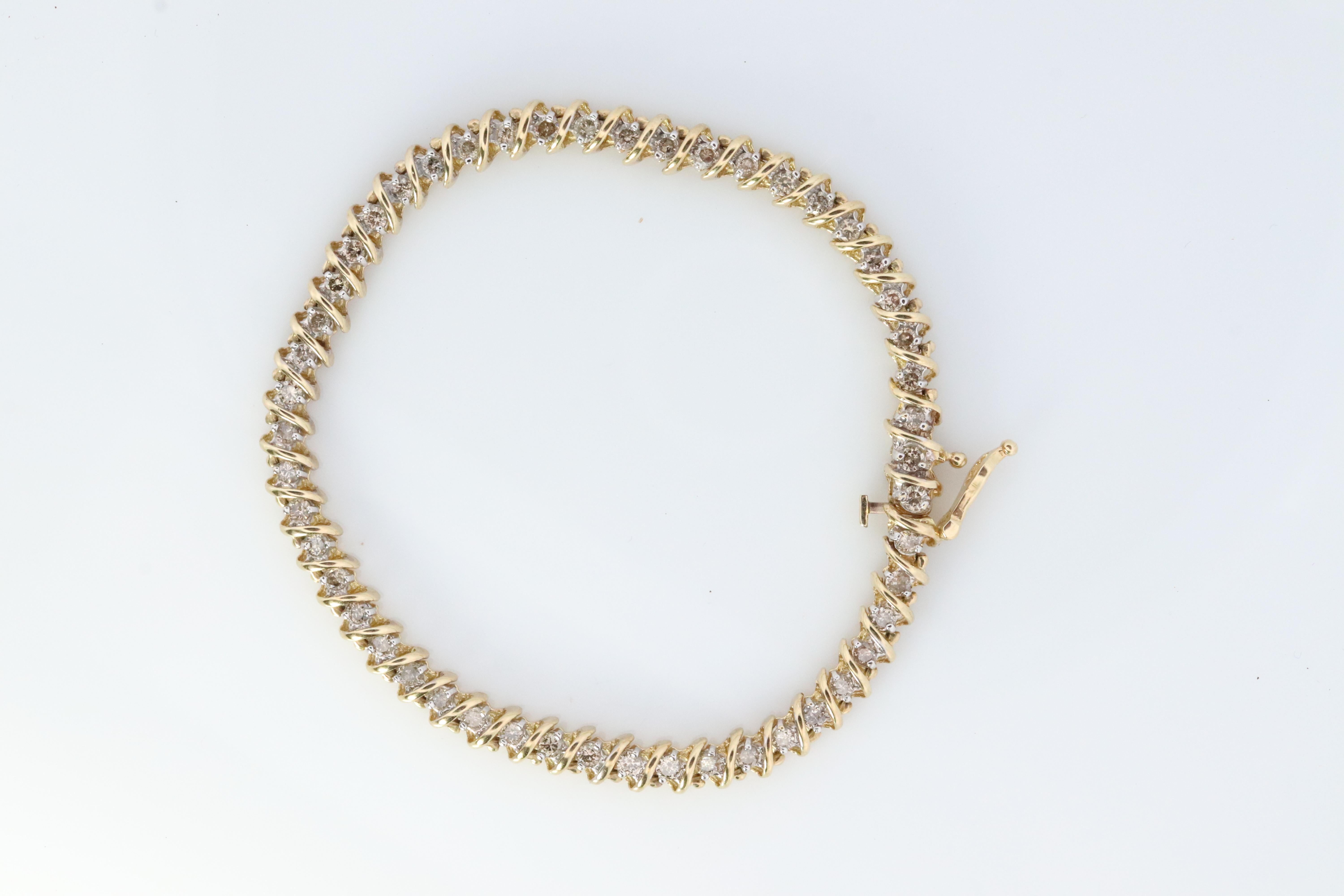 10k Diamant-Tennisarmband. 10k S-link rundes Diamant-Tennisarmband. 2,5 Karat. (Rundschliff)