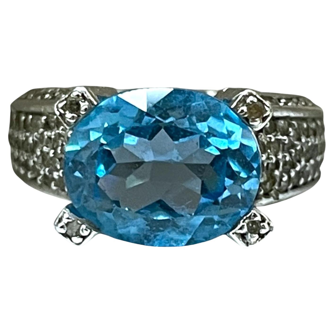 Solid Elegant White Gold Blue Topaz Ring with Diamond Accents