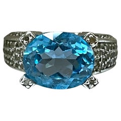 Solid Elegant White Gold Blue Topaz Ring with Diamond Accents