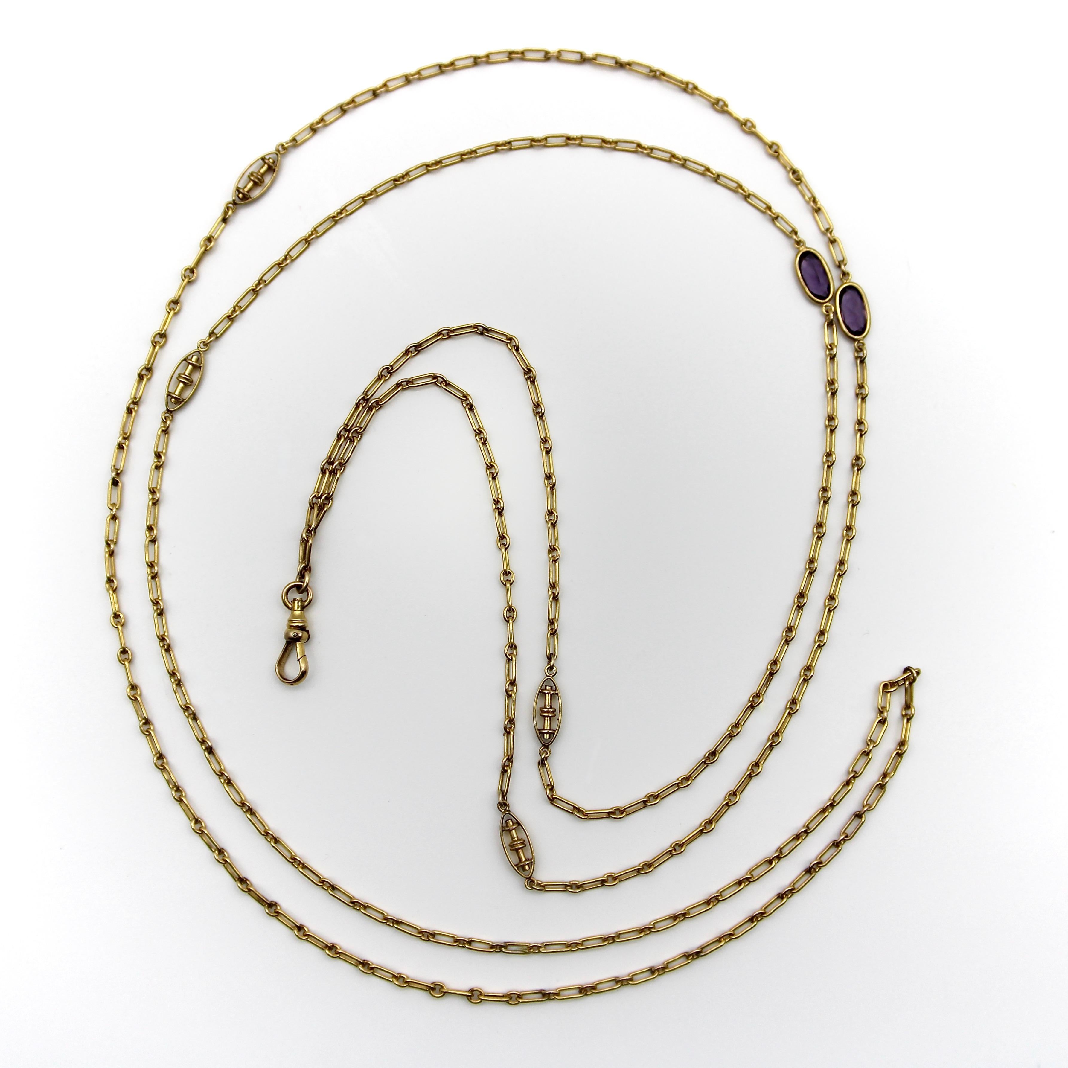 It’s always good to have an extra long chain in your collection, and this 10k gold 52” long Edwardian chain is the perfect piece to wear multiple ways. The chain consists of a tiny long trombone-shaped link alternating with a circular link. There
