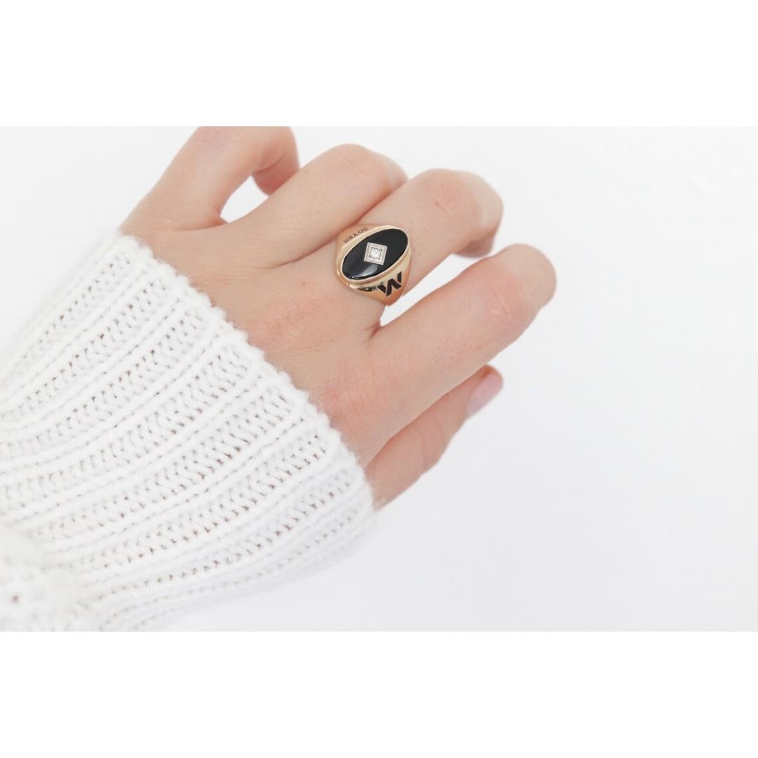Vintage from the 1980s
Size: 7 US
Materials: Gold
Gemstone: Onyx
Gem color: Black

Band color: Gold

Unique Onyx and Diamond ring. Engraved with a W on one side and 30 years on the other. See pictures

Condition: Shows minimal signs of wear. Has not