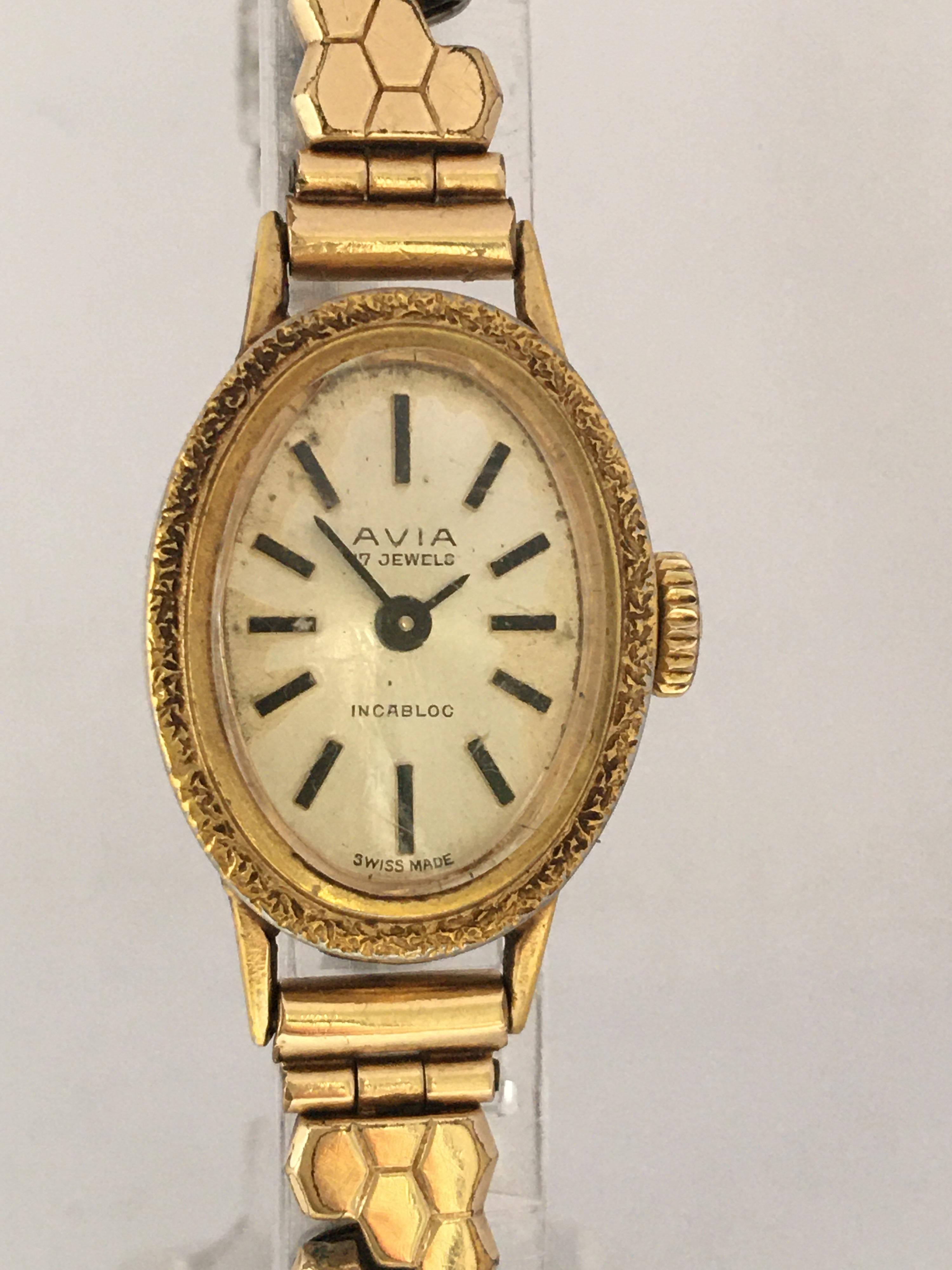 This beautiful hand winding Rolled Gold ladies watch is working and it is ticking well. Visible signs of ageing and used with slight tiny scratches on the watch case and on the glass. Its beautiful  6 inches long rolled gold and stainless steel back