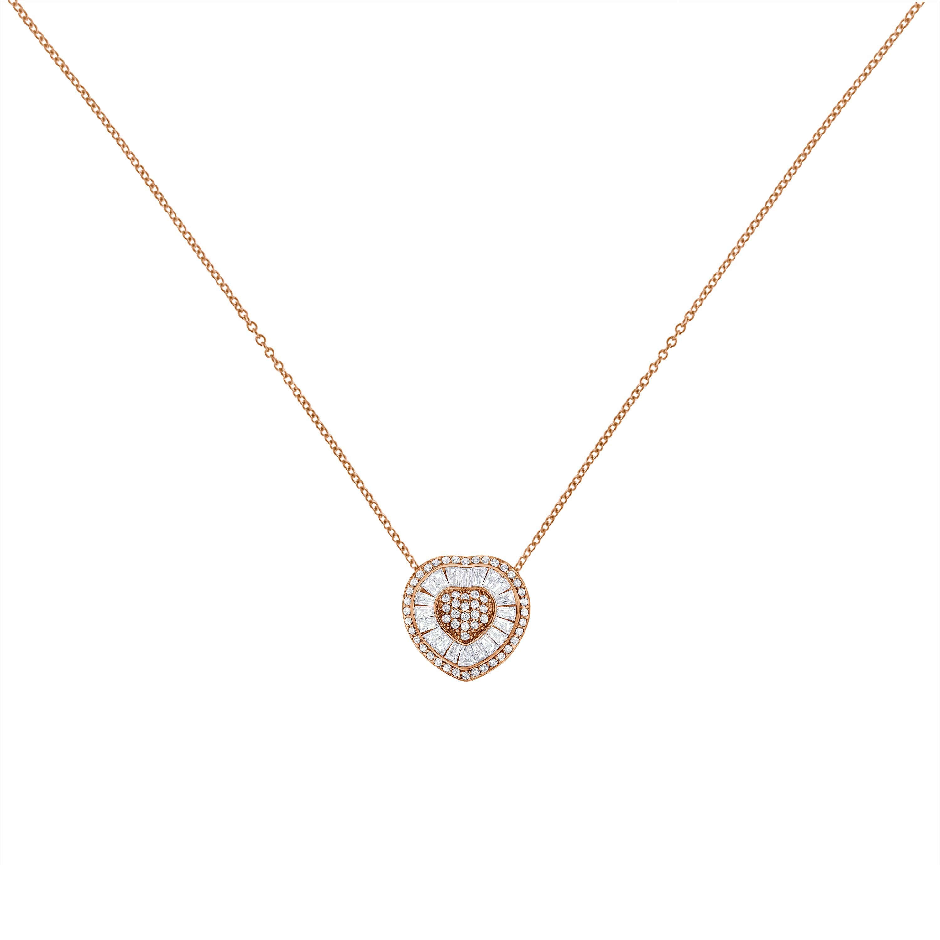 A gold and diamond heart shaped pendant. This necklace is made with 31 round and 21 baguette cut diamonds, weighing a total of 1/2 ct. The diamonds are set in lustrous 10k rose gold. It comes with a box chain.

'Video Available Upon