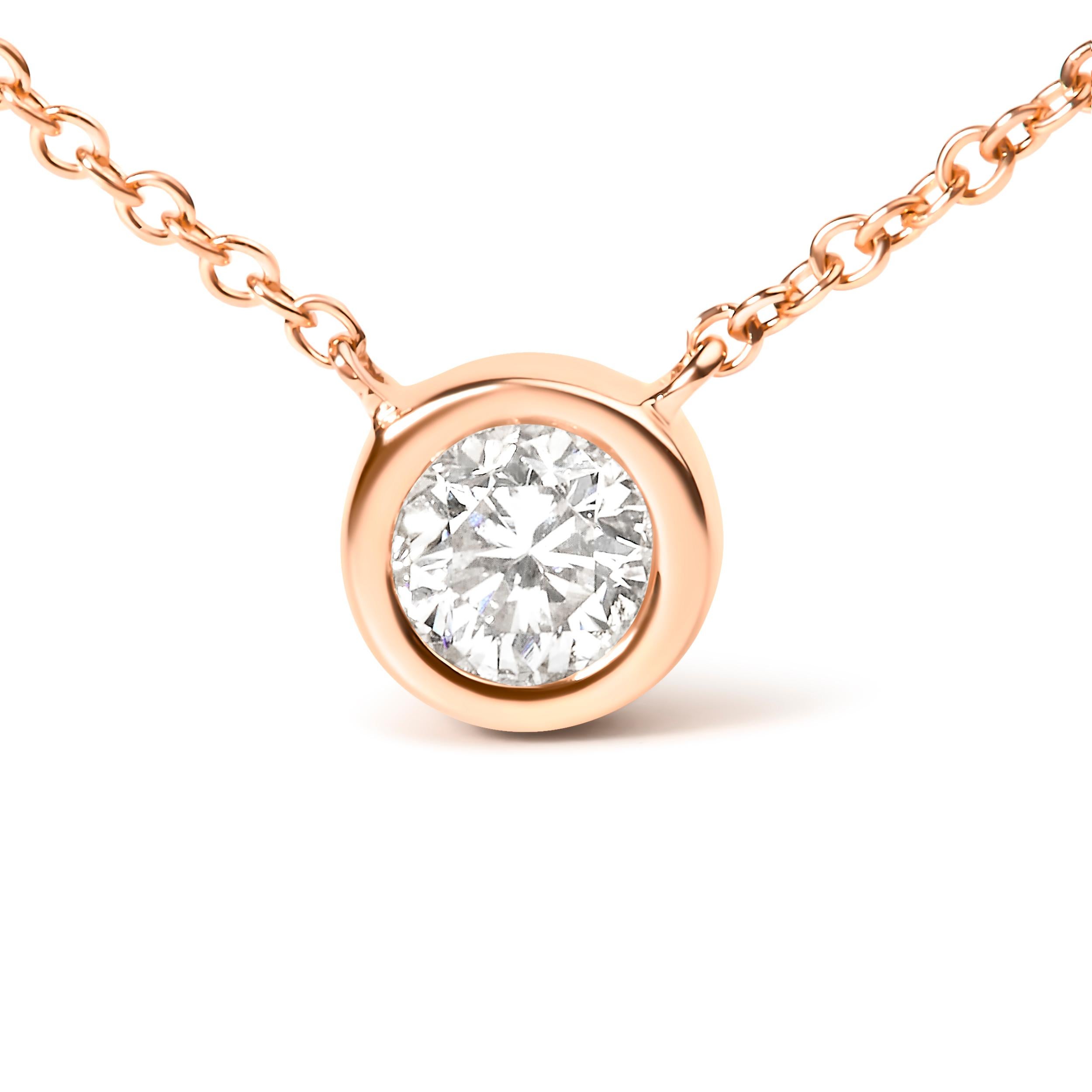 Embrace simplicity with a touch of timeless elegance with this exquisite pendant necklace, masterfully wrought from 10K rose gold, and adorned with a 1/2 carat round brilliant-cut diamond. The diamond's natural origin assures its unique character,