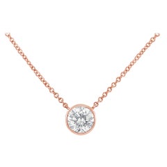 Collier pendentif solitaire en or rose 10 carats avec diamants 1/5 carat sertis sur le chaton