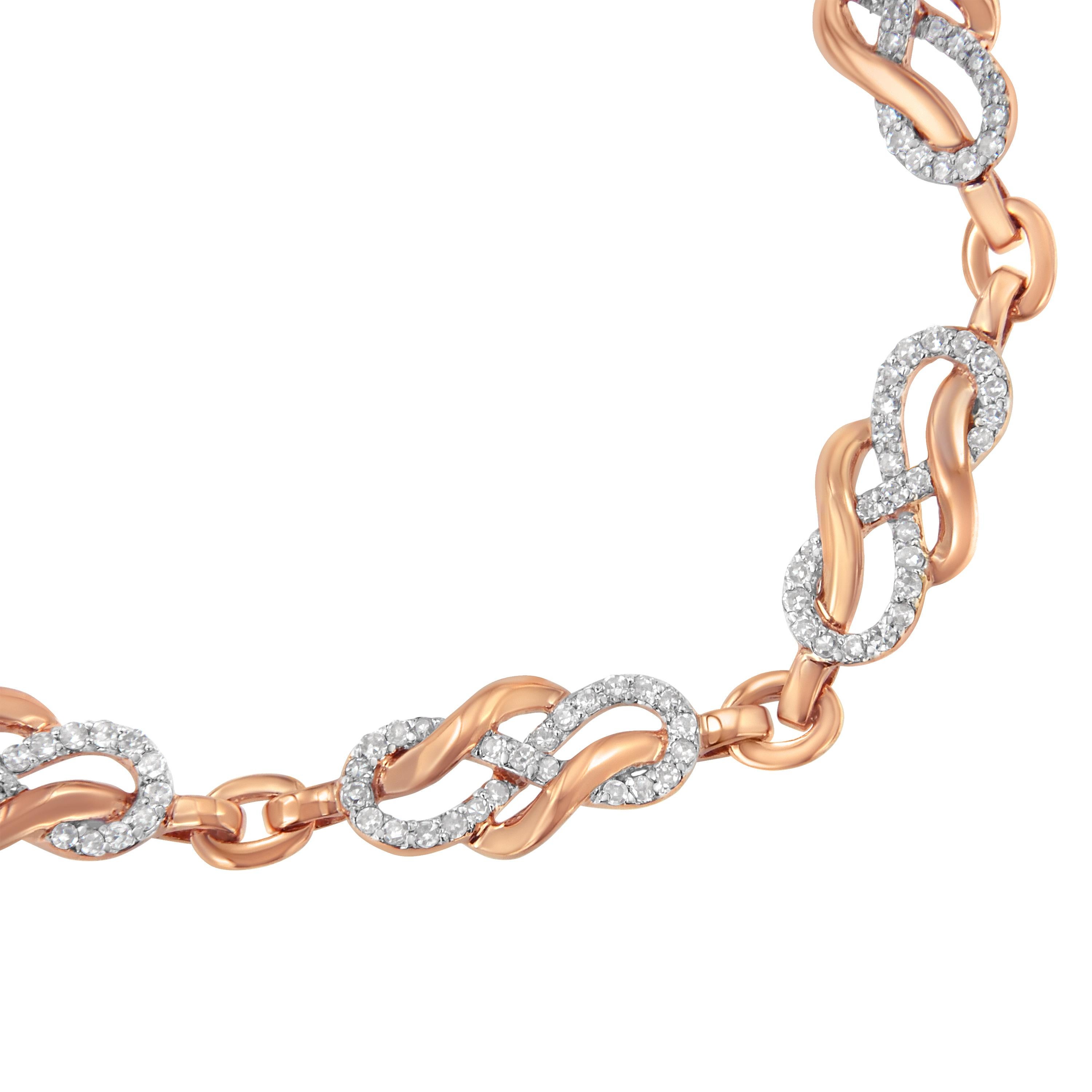 This striking piece is made for those who’re all for making a statement. The bracelet’s main charm lies in the infinity loop and swirl link design that comes in a juxtaposition of hues. The 10K rose gold chain is contrasted with 200 natural diamonds