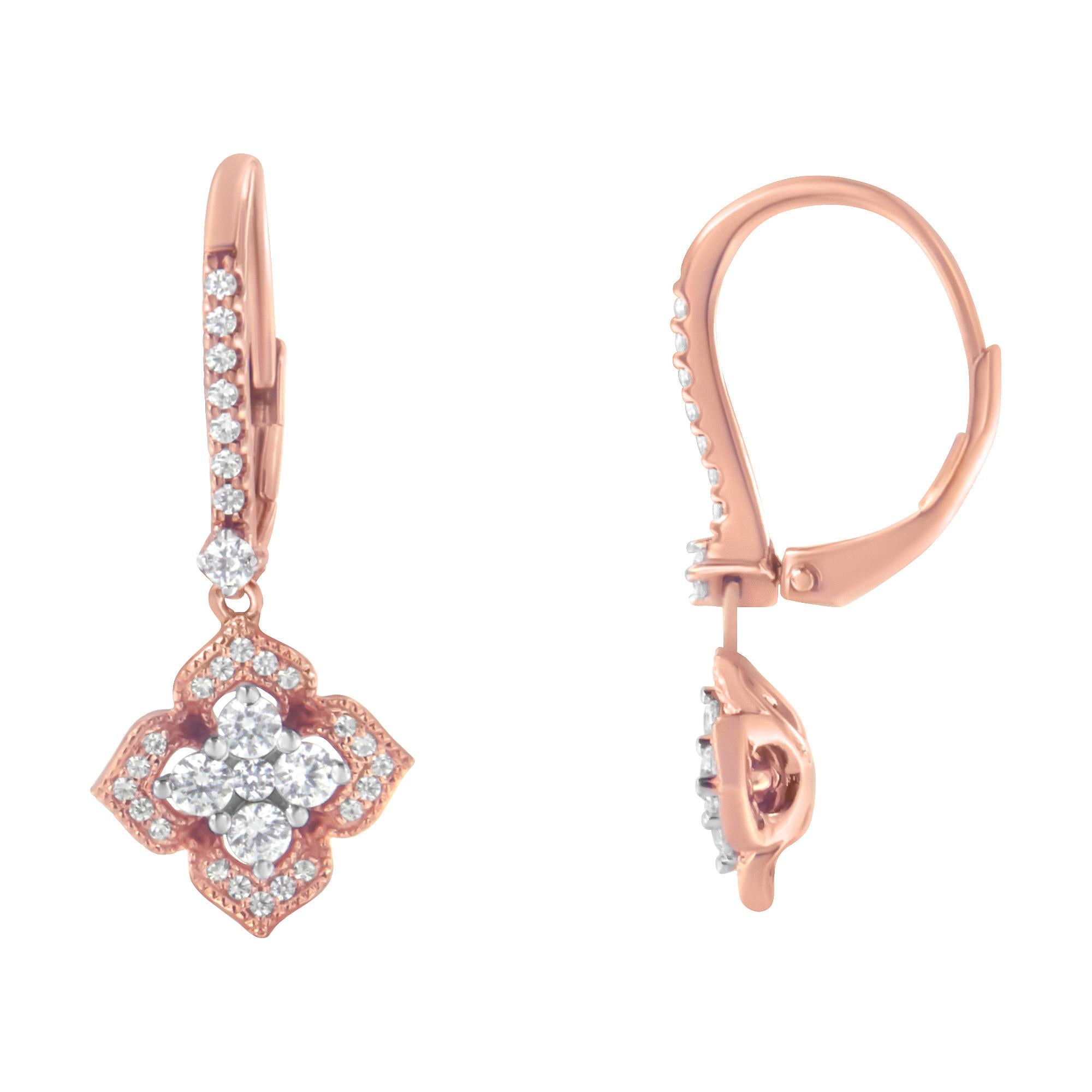 Ti presentiamo un capolavoro accattivante che farà girare la testa e battere il cuore! Questi squisiti orecchini pendenti in oro rosa 10K sono impreziositi da un'affascinante serie di 66 diamanti rotondi, per un totale di ben 3/4 carati. Realizzati