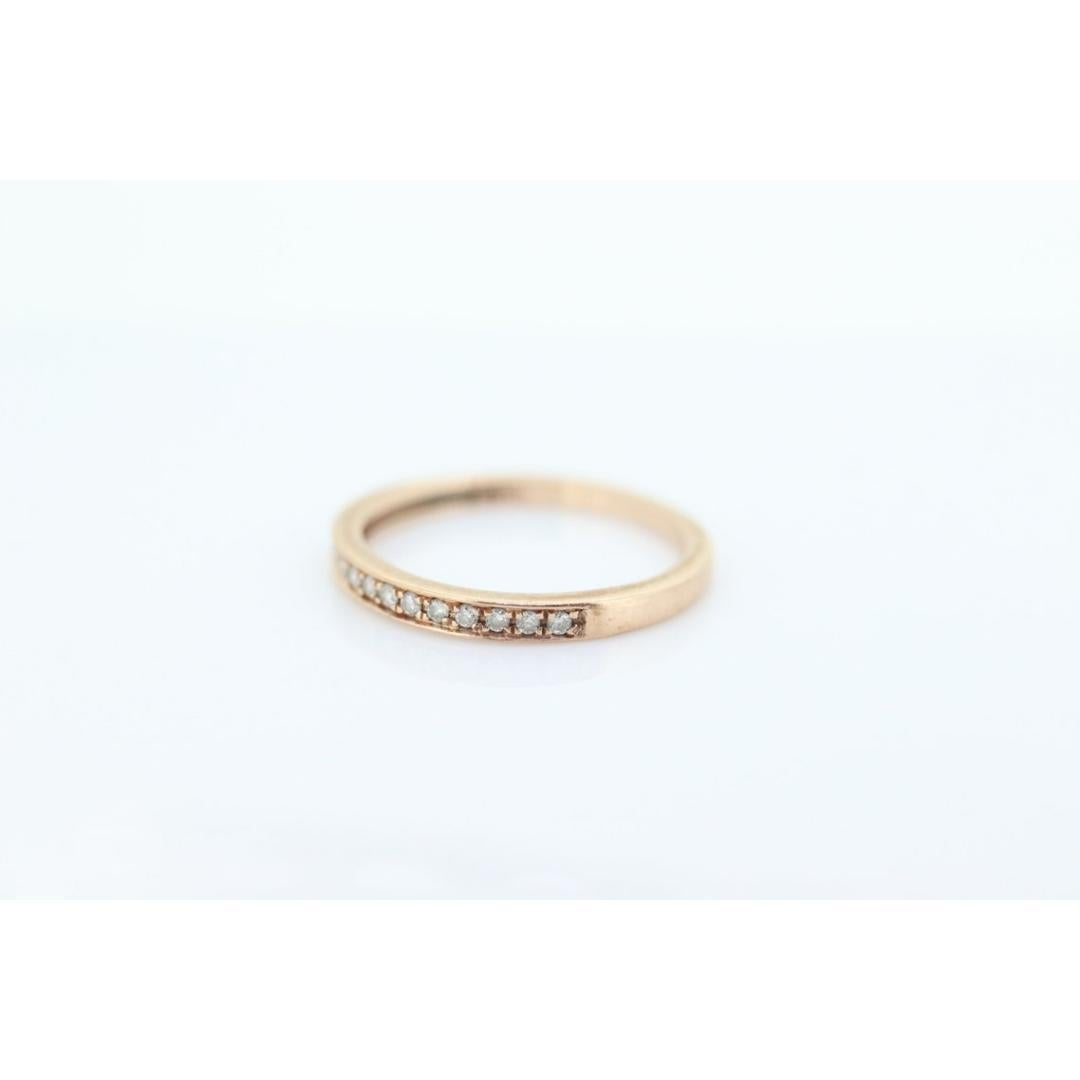 Vintage from the 1990s
Size: 5 US
Materials: Stone
Gemstone: Diamond
Gem color: Colorless
Band color: Rose gold

Style: Minimalist

Princess cut Double Halo Engagement set, Bridal Set, or Wedding set. Includes the Engagement ring and dainty wedding