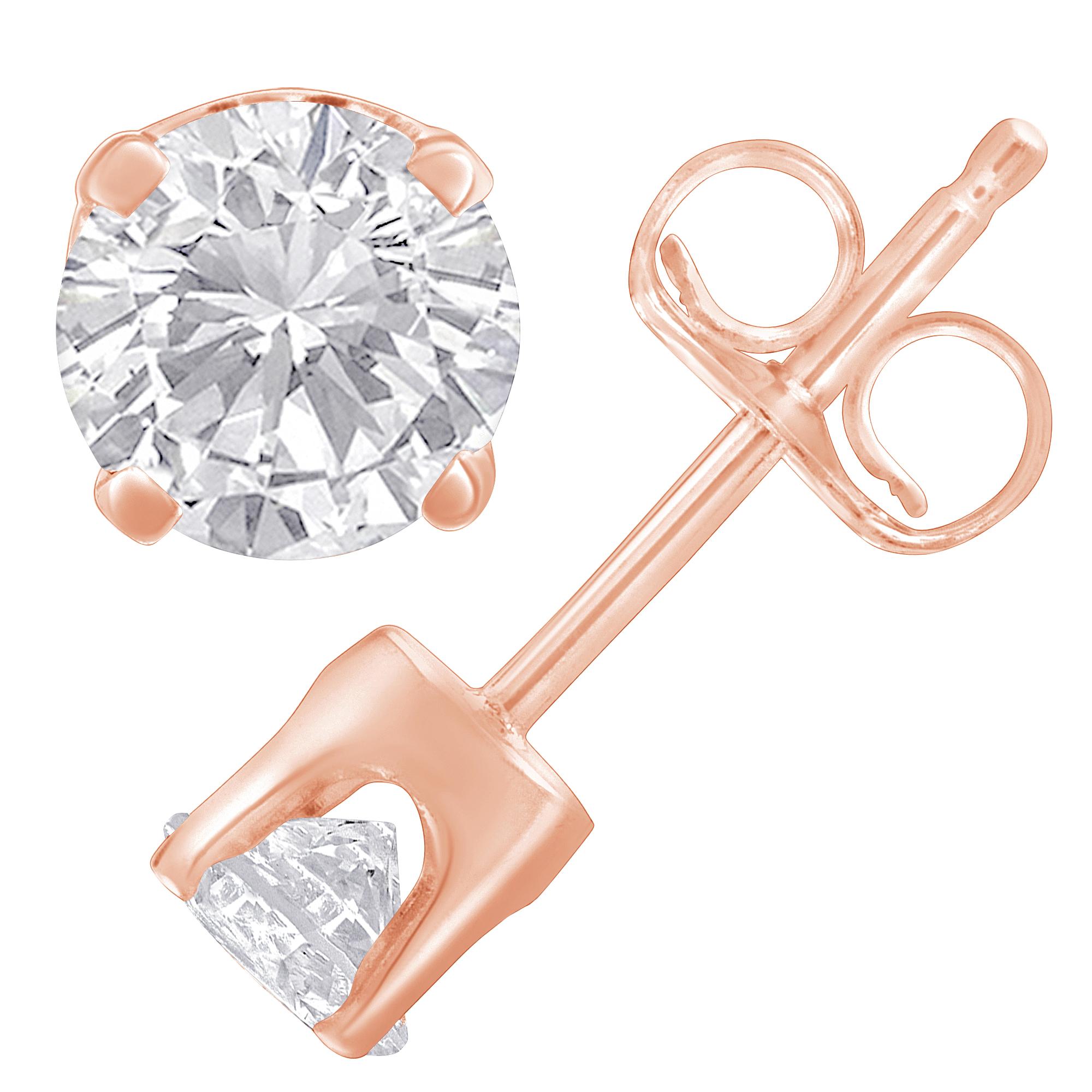 Ces boucles d'oreilles étincelantes sont serties de deux magnifiques diamants blancs. Fabriquées en argent sterling .925, ces boucles d'oreilles en diamant présentent une finition polie. Ces superbes boucles d'oreilles en argent présentent le poids