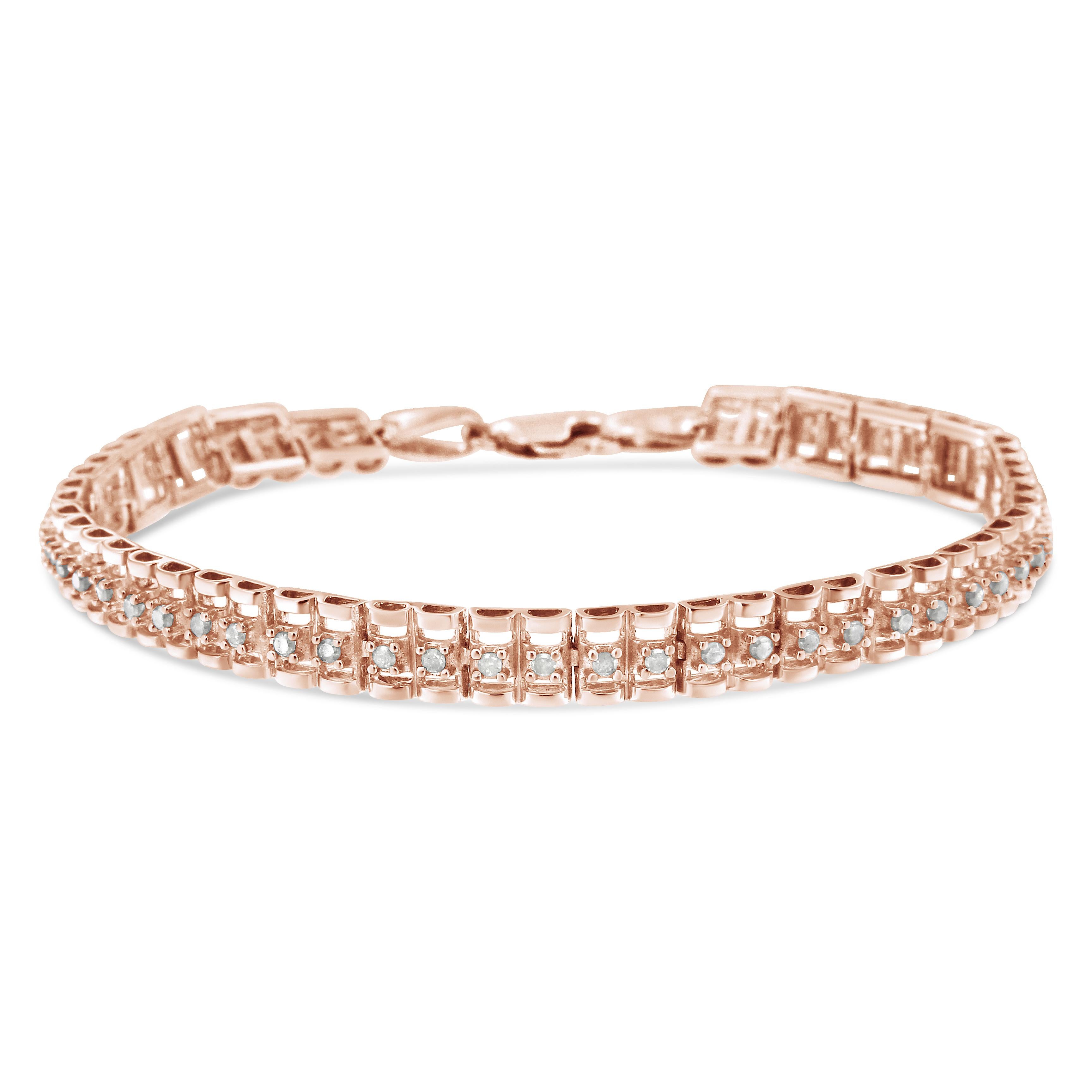 This gorgeous .925 sterling silver tennis bracelet features 2.0 carat total weight with 48 round, rose cut diamonds. The tennis bracelet has hinged links with two shapes surrounding two diamonds on each side. Rose-cut, promo quality diamonds are