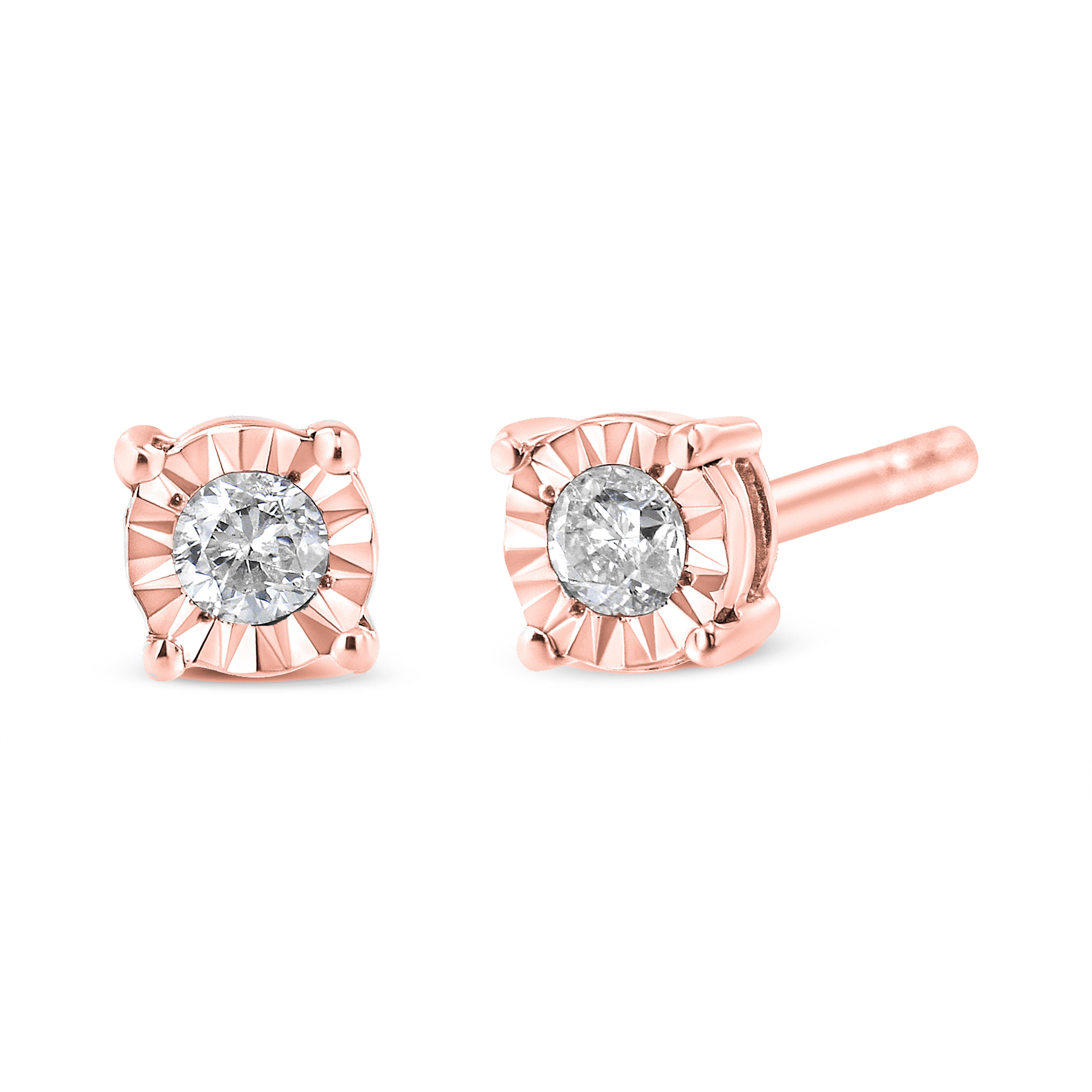 Add a shimmering touch to your wardrobe with these elegant and extravagant diamond earrings. Fashioned in the round shape, the earrings are crafted of your choice of sterling silver plated with white rhodium, or with 10K rose or yellow gold
