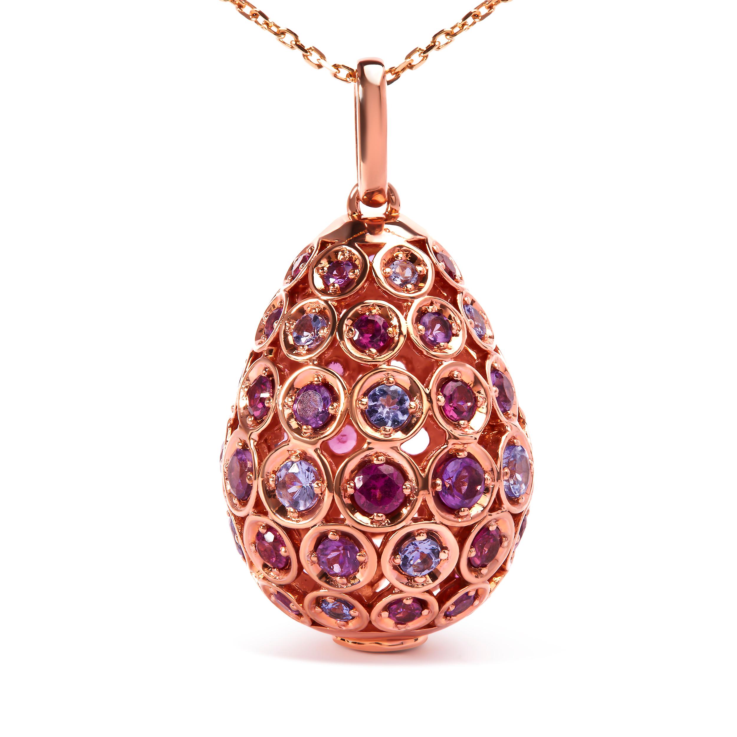 Introducing a captivating masterpiece that will leave you spellbound. This exquisite pendant necklace features a mesmerizing array of rainbow-colored gemstones, delicately shaped like an elegant egg. Crafted with love from 10K rose gold plated .925