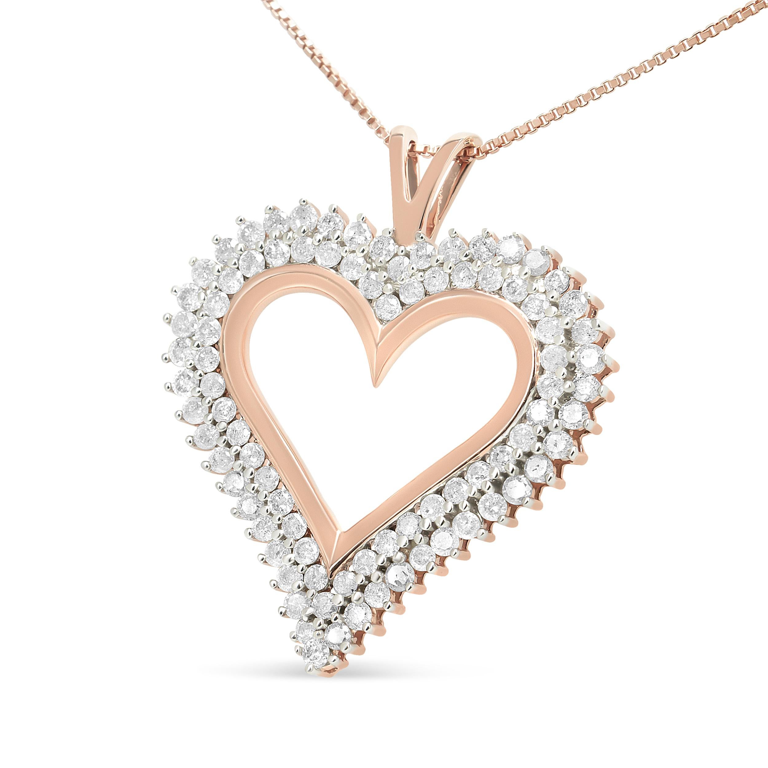 Celebrate someone you love with this stunning diamond heart pendant. This diamond necklace features 2 rows of round diamonds prong set along the edge of this open heart shape crafted of stunning .925 sterling silver, with a matching box chain