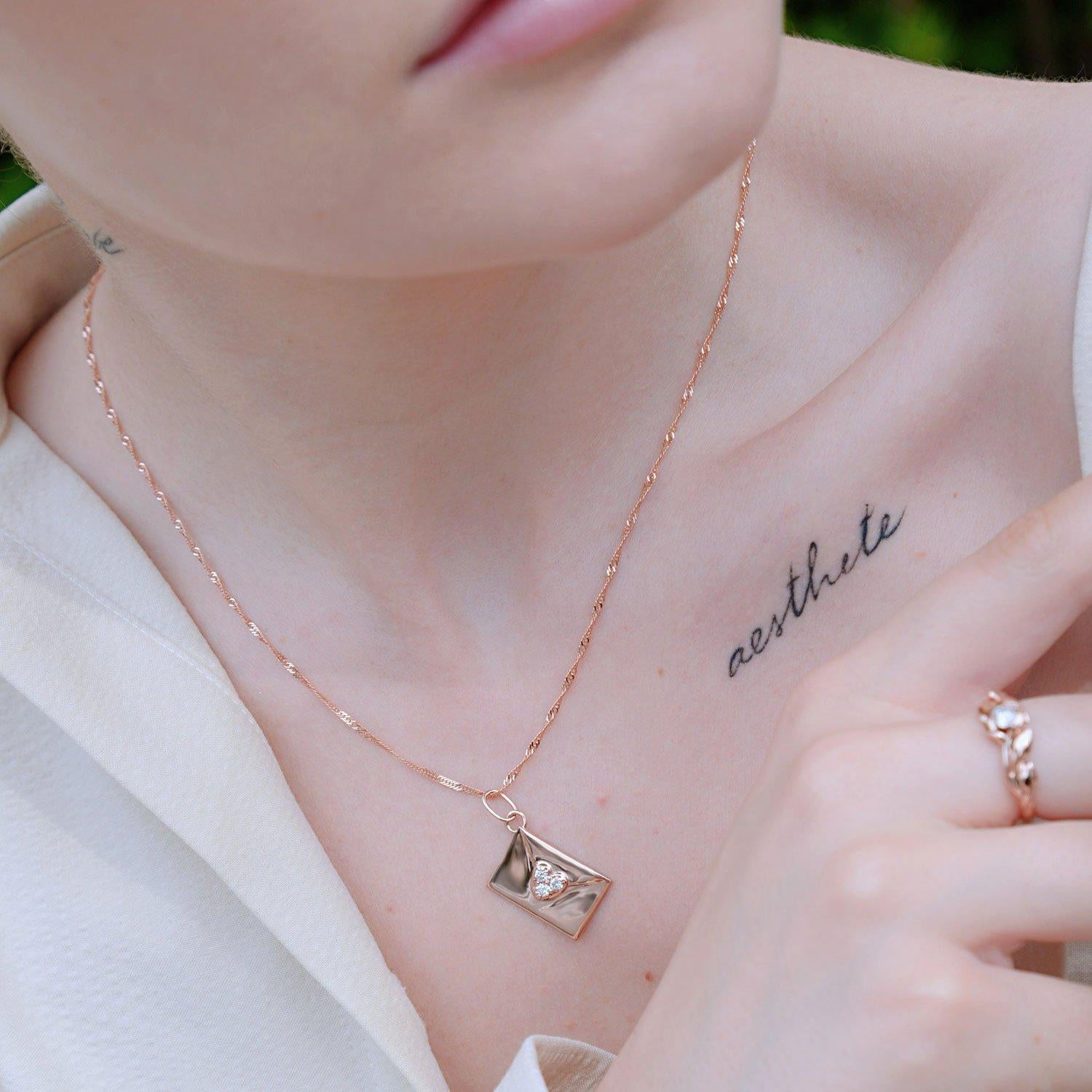 Brilliant Cut 10k Rose Gold The Love Voice Charm Necklace, Natural Diamonds'.18t.c.w' For Sale
