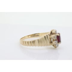 10k Ruby and Diamond HALO ring. 10k Yellow Gold Ribbed shank Ruby Halo ring