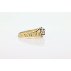 10k Ruby and Diamond HALO ring. 10k Yellow Gold Ribbed shank Ruby Halo ring.