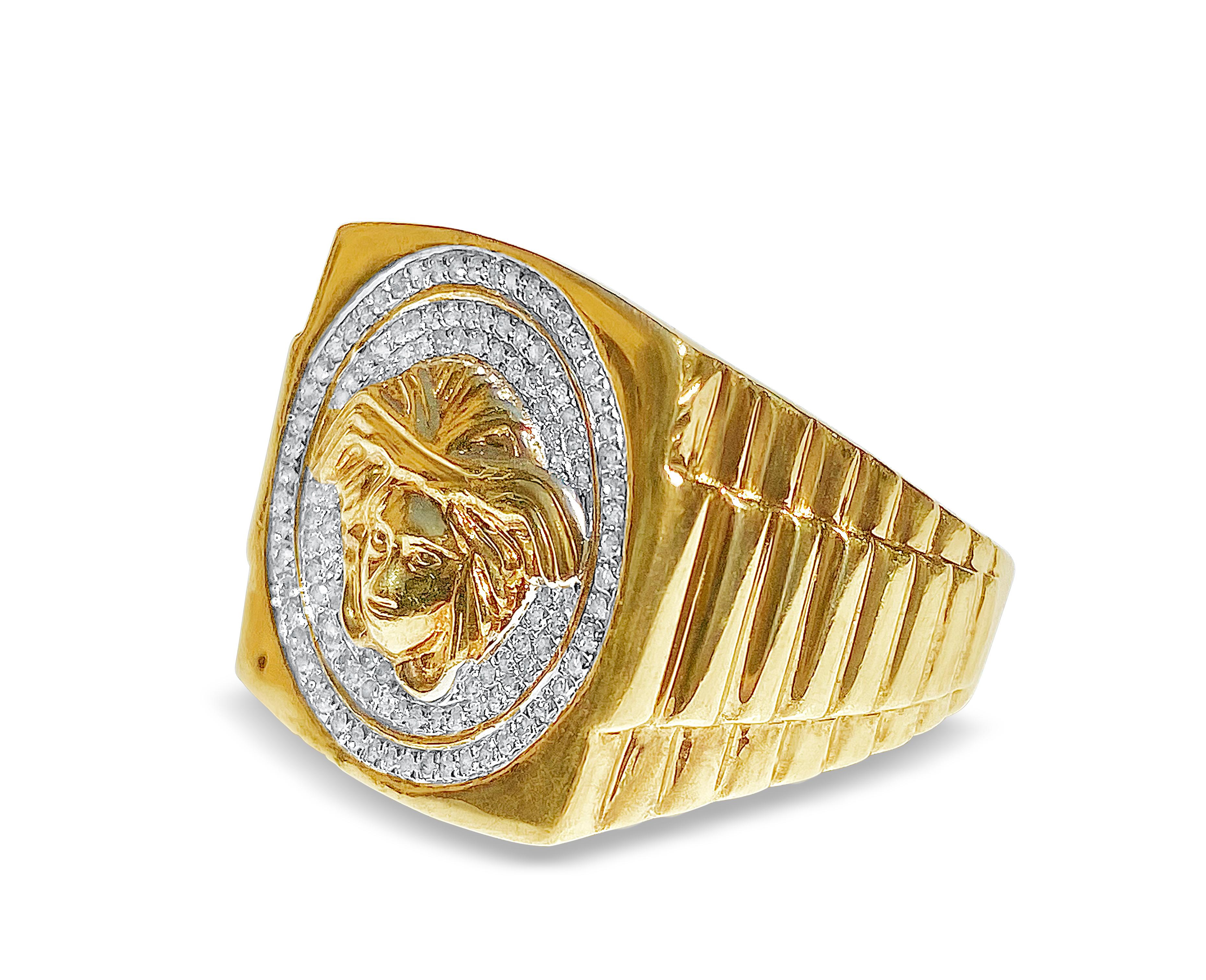 Custom made 10k solid gold mens ring with 0.40 carats in natural diamonds. Carved gold shank with gallery ring back setting for a smooth and comfortable fit. The rings face depicts a gold medusa figure, inspired by the Versace logo. 10k gold setting