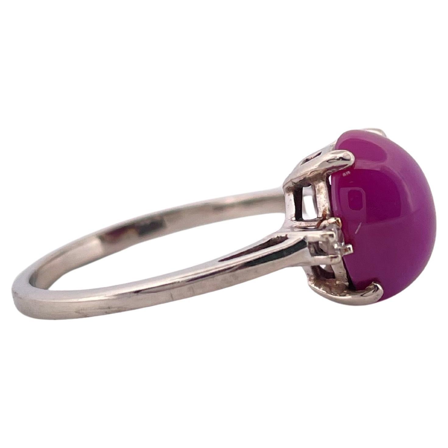 Taille cabochon Bague 10K rubis étoilé et diamant 0.06ctw H SI1 en vente
