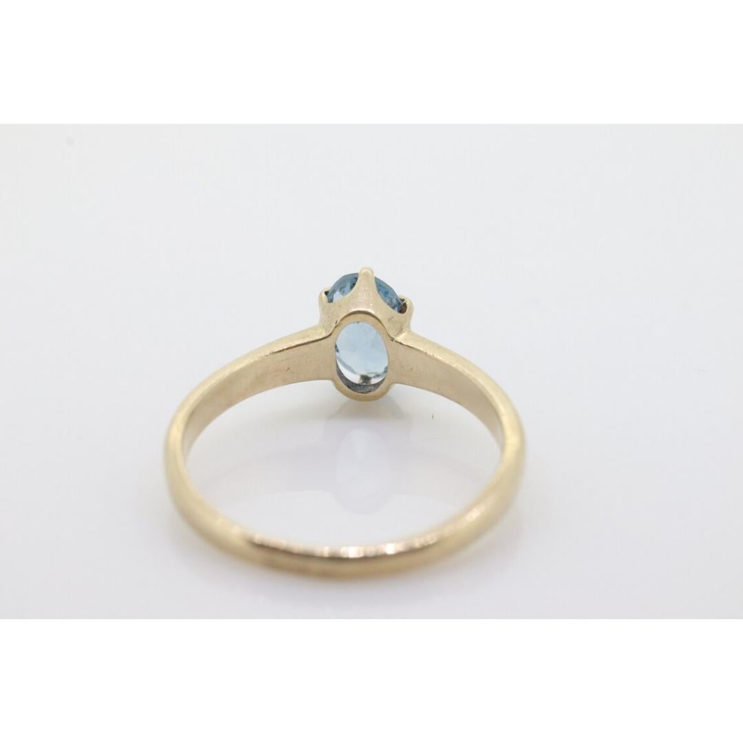 Vintage from the 1920s
Size: 5 US
Materials: Stone
Gemstone: Topaz
Gem color: Blue
Style: Minimalist

Stunning LONDON blue topaz.

10k Yellow gold made by HANDWROUGHT.

Details:
5mm by 7mm oval LONDON Blue Topaz
1.6grams