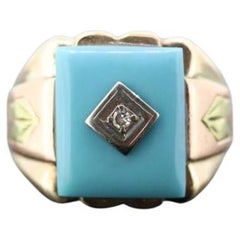 10k Turquoise and diamond ring. Heavy Mens Turquoise and center diamond