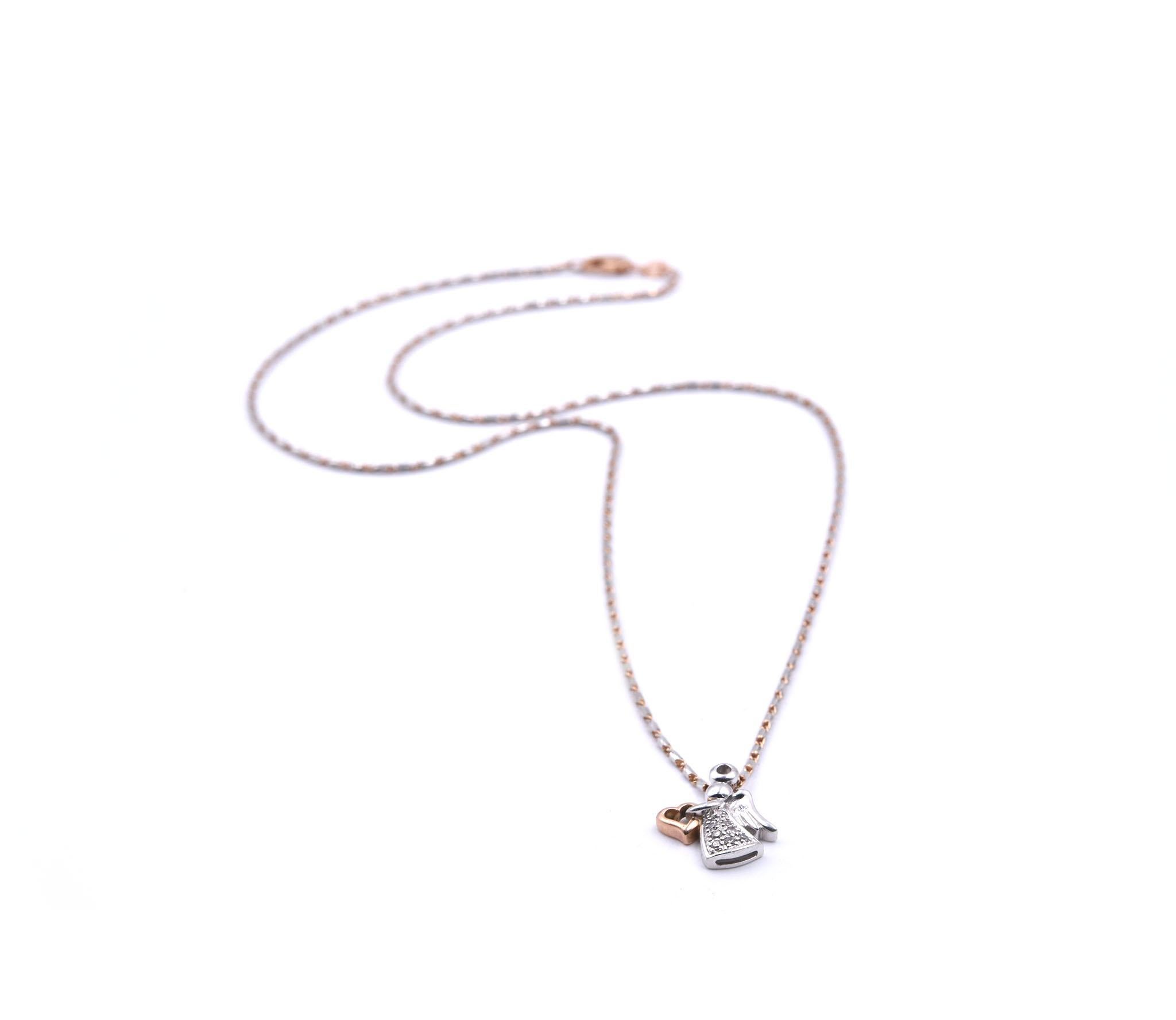 Designer: custom design
Material: 14k white and rose gold
Diamonds: 8 round brilliant cut = .04cttw
Color: G
Clarity: VS
Dimensions: necklace is 18-inches, angel pendant is ½-inch long and 13.22mm Weight: 19.57 grams 
