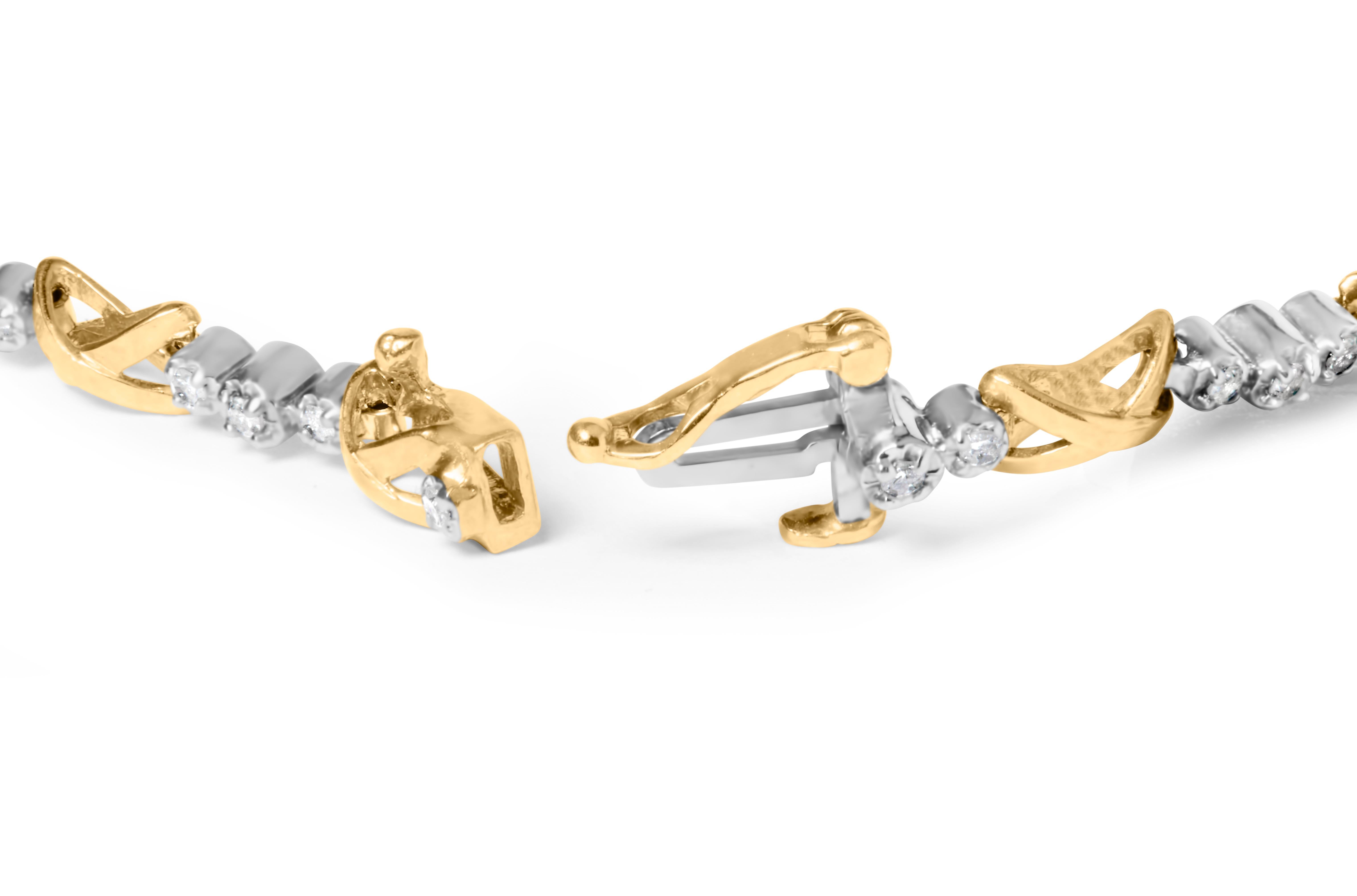 Ce bracelet captivant en diamants bicolores est un témoignage de grâce et de sophistication. Méticuleusement réalisée en or bicolore 10K, cette pièce exquise respire l'élégance intemporelle. Orné de 36 diamants ronds naturels, totalisant un