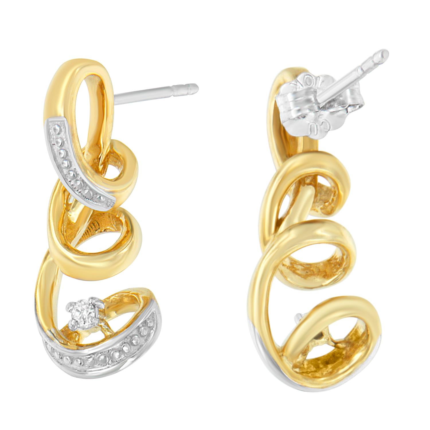 Simple yet stunning, these earrings are decorated with eye grabbing Round cut diamonds for an impressive weight of 0.05 carat masterfully set in finely polished 10K Two Tone gold. These natural diamonds are color rated as J-K Color, and clarity