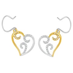 Orecchini a cuore con diamante rotondo da 1/4 di carato in oro 10K bicolore