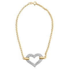 Bracelet 7" en or bicolore 10K avec breloques en forme de coeur incrustées de diamants 1/4 Cttw