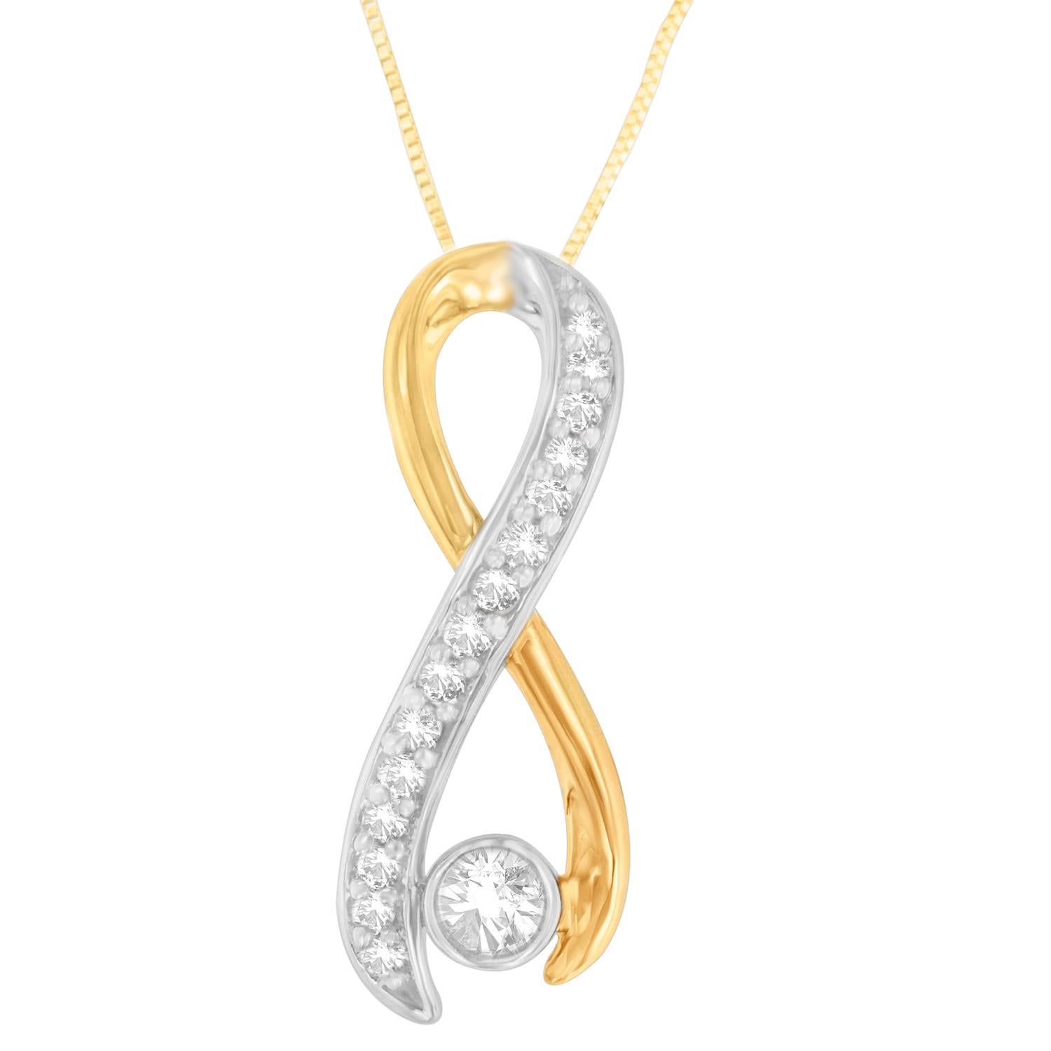 L'intramontabile oro giallo si sviluppa a cascata intorno a un vortice di oro bianco impreziosito da diamanti per creare una scintillante forma a spirale collegata da una singola pietra rotonda nella parte inferiore. Con stile ed eleganza, questa