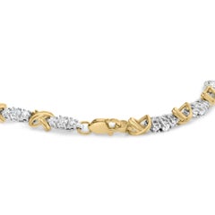 Pulsera de eslabones en X de oro bicolor de 10 quilates y 1,00 qt de diamante