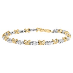 Pulsera de eslabones en X de oro bicolor de 10 quilates y 1,00 qt de diamante