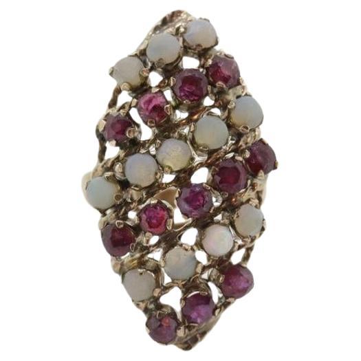 10k Victorian Opal and Garnet Cluster ring. 10k Yellow Gold with Claw set opal