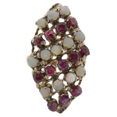 10k Victorian Opal and Garnet Cluster ring. 10k Yellow Gold with Claw set opal