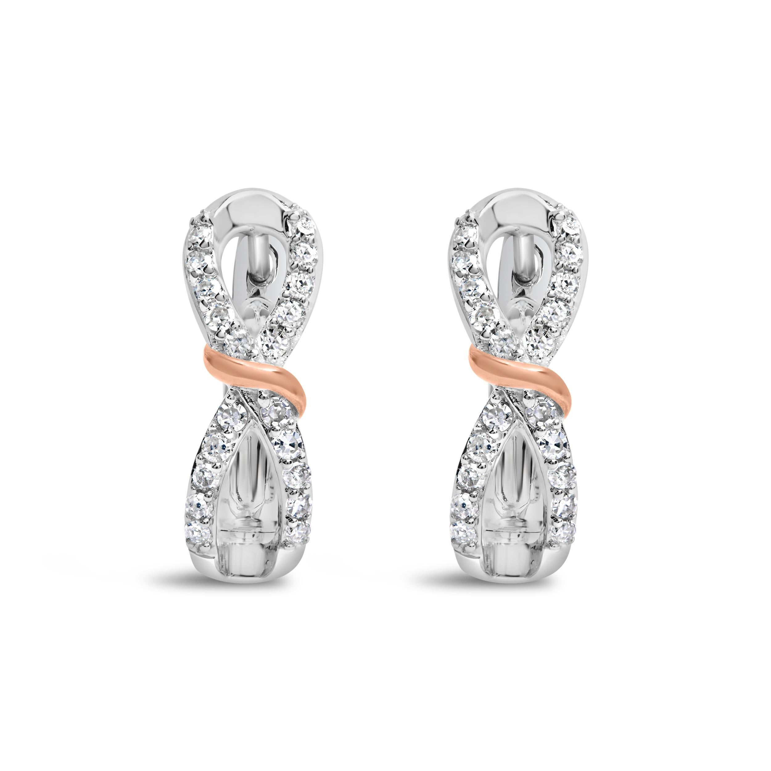 Ti presentiamo un capolavoro senza tempo che cattura senza sforzo l'essenza dell'eleganza e della grazia. Questi squisiti orecchini a cerchio in oro bianco e rosa 10 carati sono impreziositi da un'incantevole serie di diamanti naturali, per un