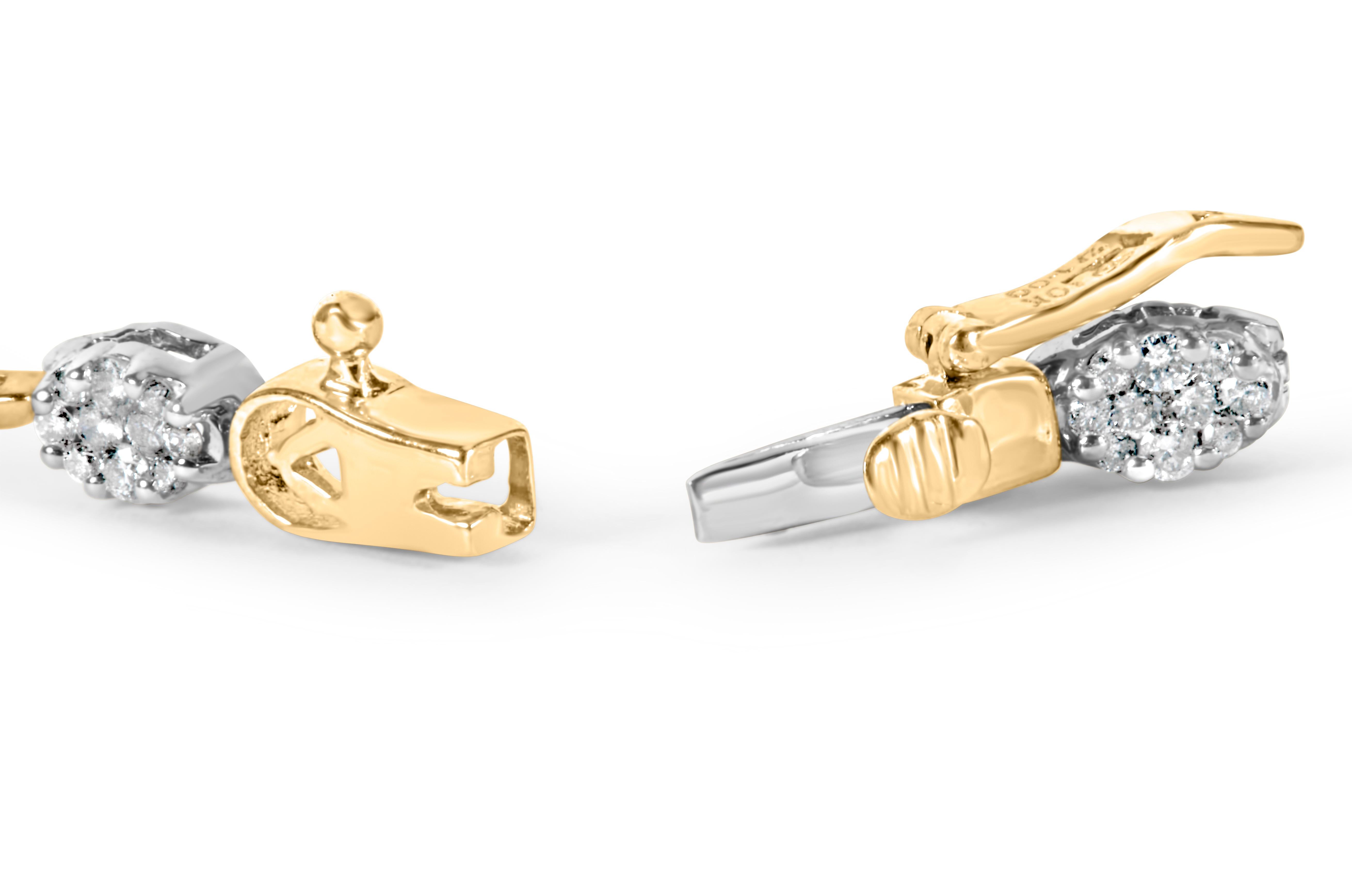 Laissez-vous séduire par l'élégance intemporelle de notre bracelet à maillons en or blanc et jaune 10 carats, orné de diamants de forme ovale. Cette pièce exquise est méticuleusement réalisée avec 100 diamants ronds naturels, totalisant 1,00 cttw.