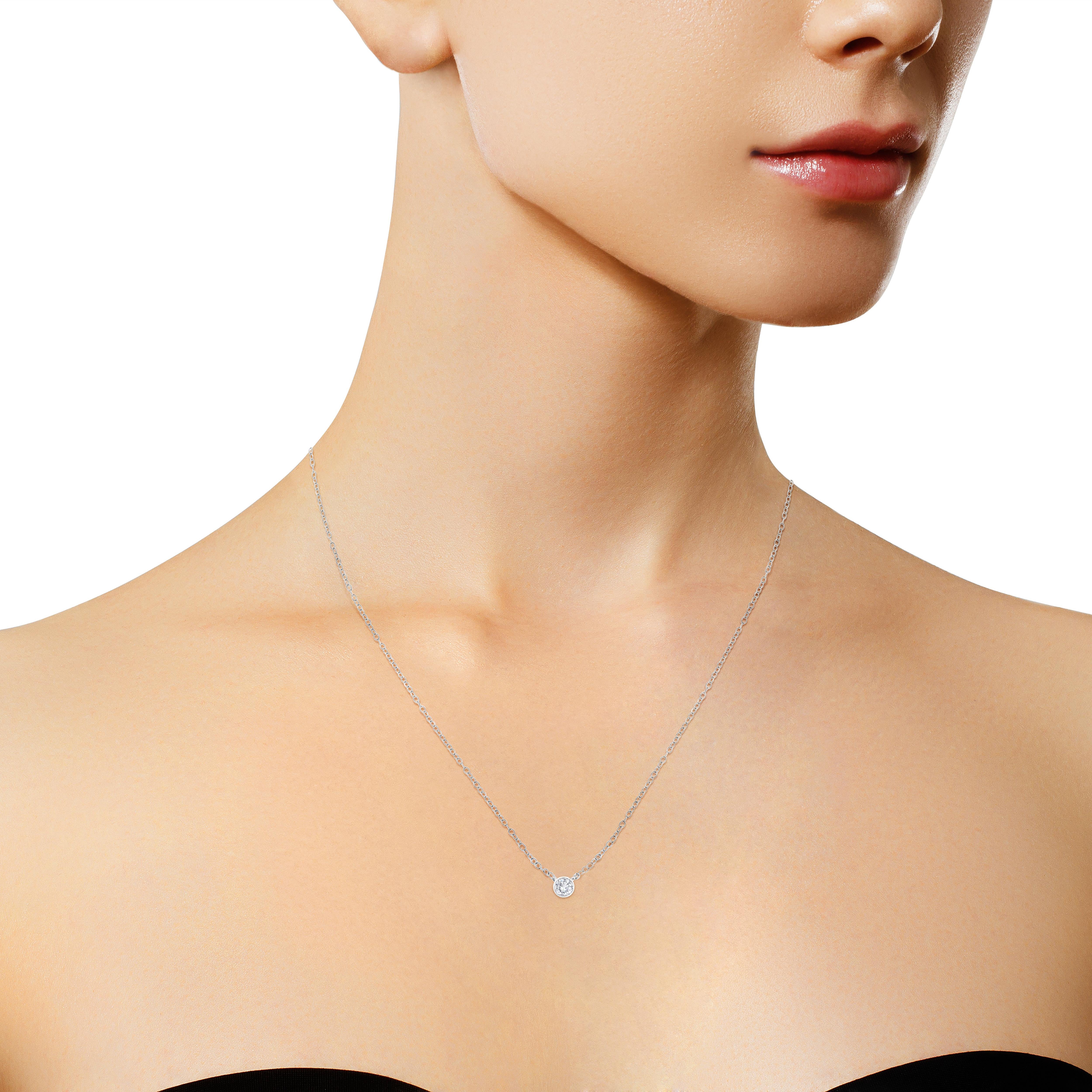 Round Cut 10K White Gold 1/10 Carat Diamond Modern Bezel-Set Solitaire Pendant Necklace For Sale