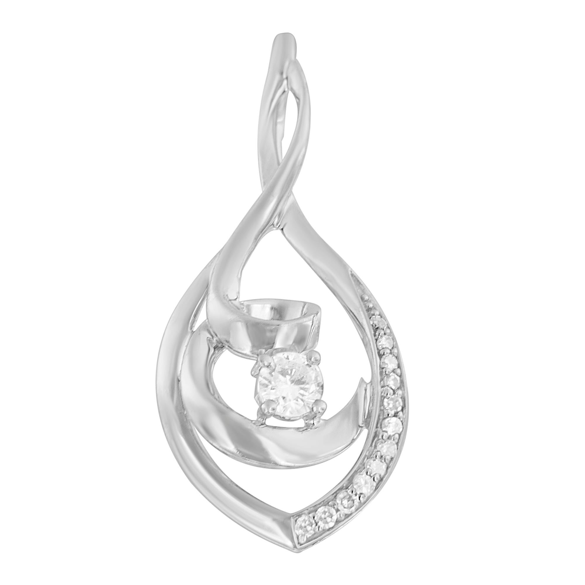 Flaunt your gorgeous looks by wearing this elegant diamond fashion pendant. Sophisticated in design, the pendant is made using glistening ten karats white gold and is buffed high to luster. This beautiful pendant is decorated with sparkling round