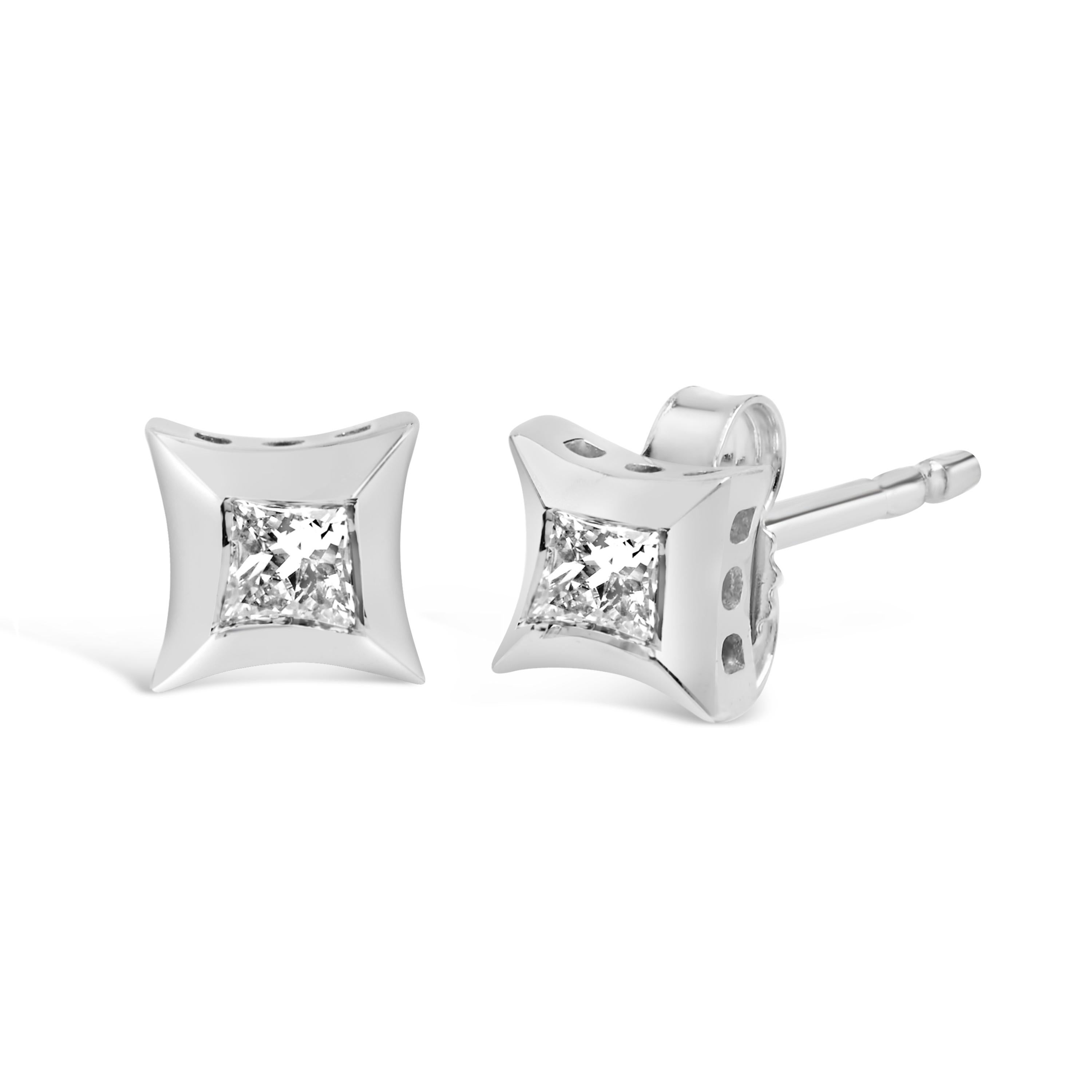 Introducing a dazzling pair of earrings that will make heads turn and hearts skip a beat. Crafted in 10K white gold, these exquisite stud earrings feature a captivating duo of princess-cut diamonds. With a total weight of 1/5 carats, these diamonds