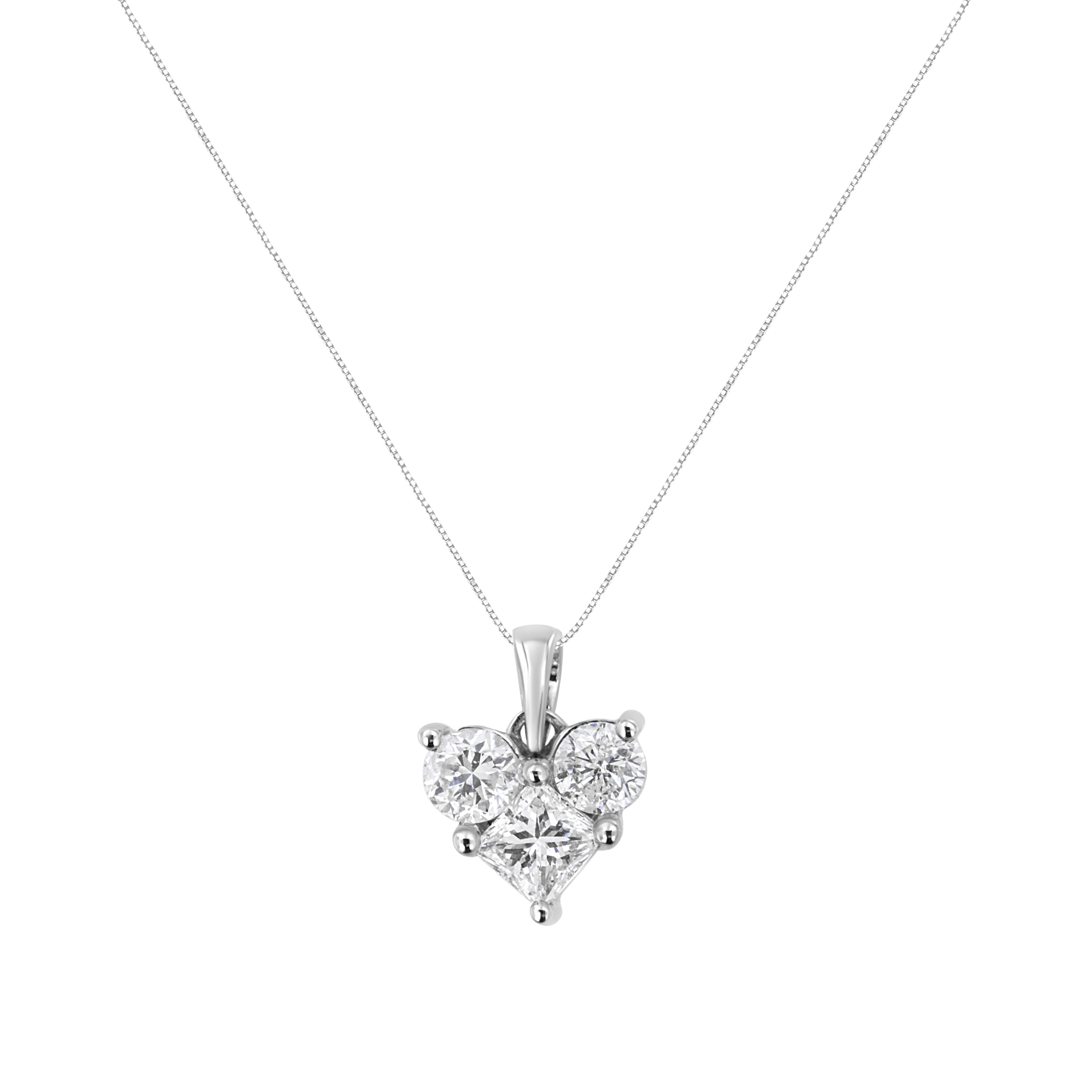 A story of pure elegance, these glamorous pendant showcases brilliant natural diamonds that are set in enduring 10k white gold. A magical look she'll turn to often, this necklace is designed with two round-cut diamonds and one princess-cut diamond