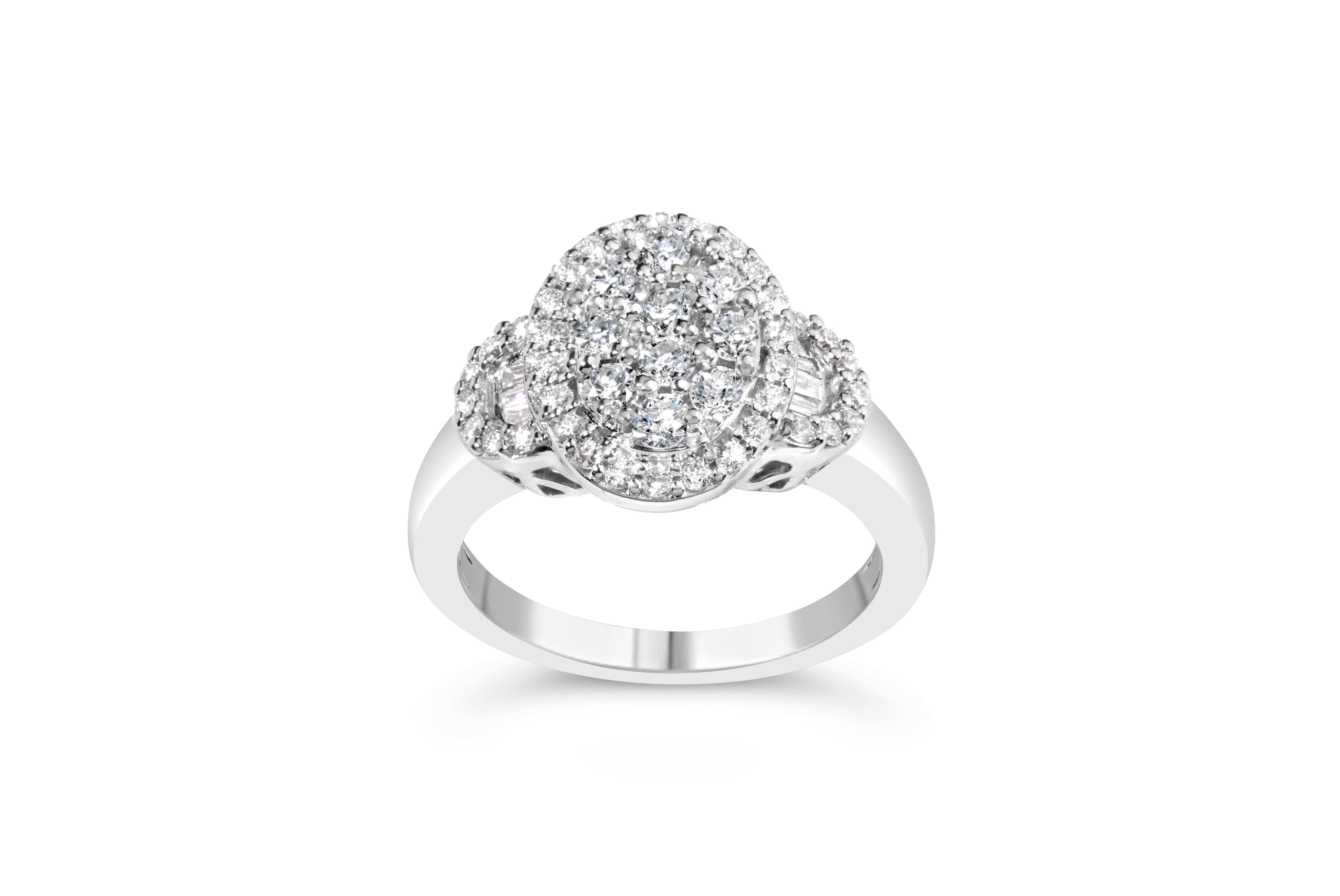 Elegant and timeless, this 10K white gold diamond cocktail ring features 1.0 carat total weight of diamonds with an astonishing 52 individual stones. The fashion ring features an oval shaped cluster inset with round, brilliant cut white diamonds in