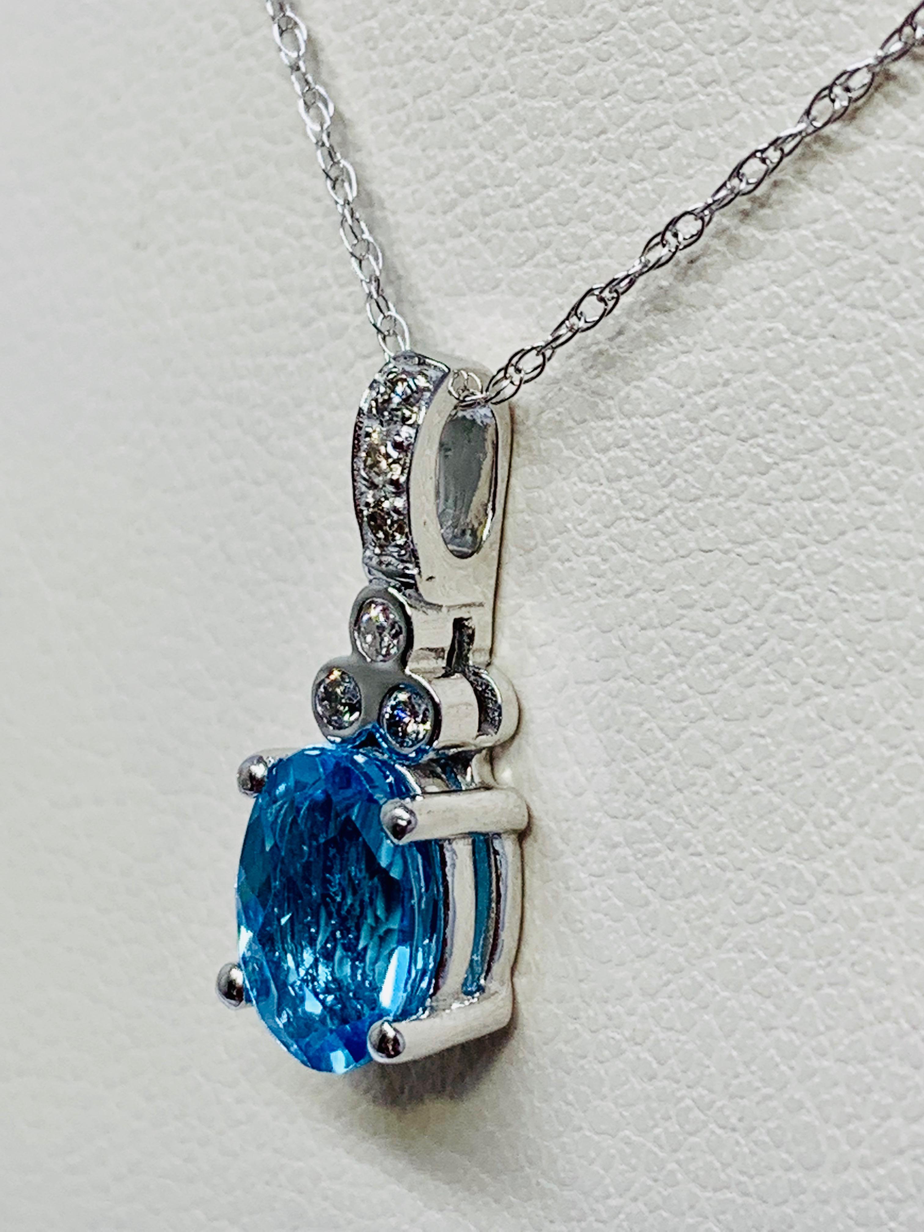 Contemporary 10 Karat White Gold 1.35 Carat Total Weight Blue Topaz and Diamond Necklace